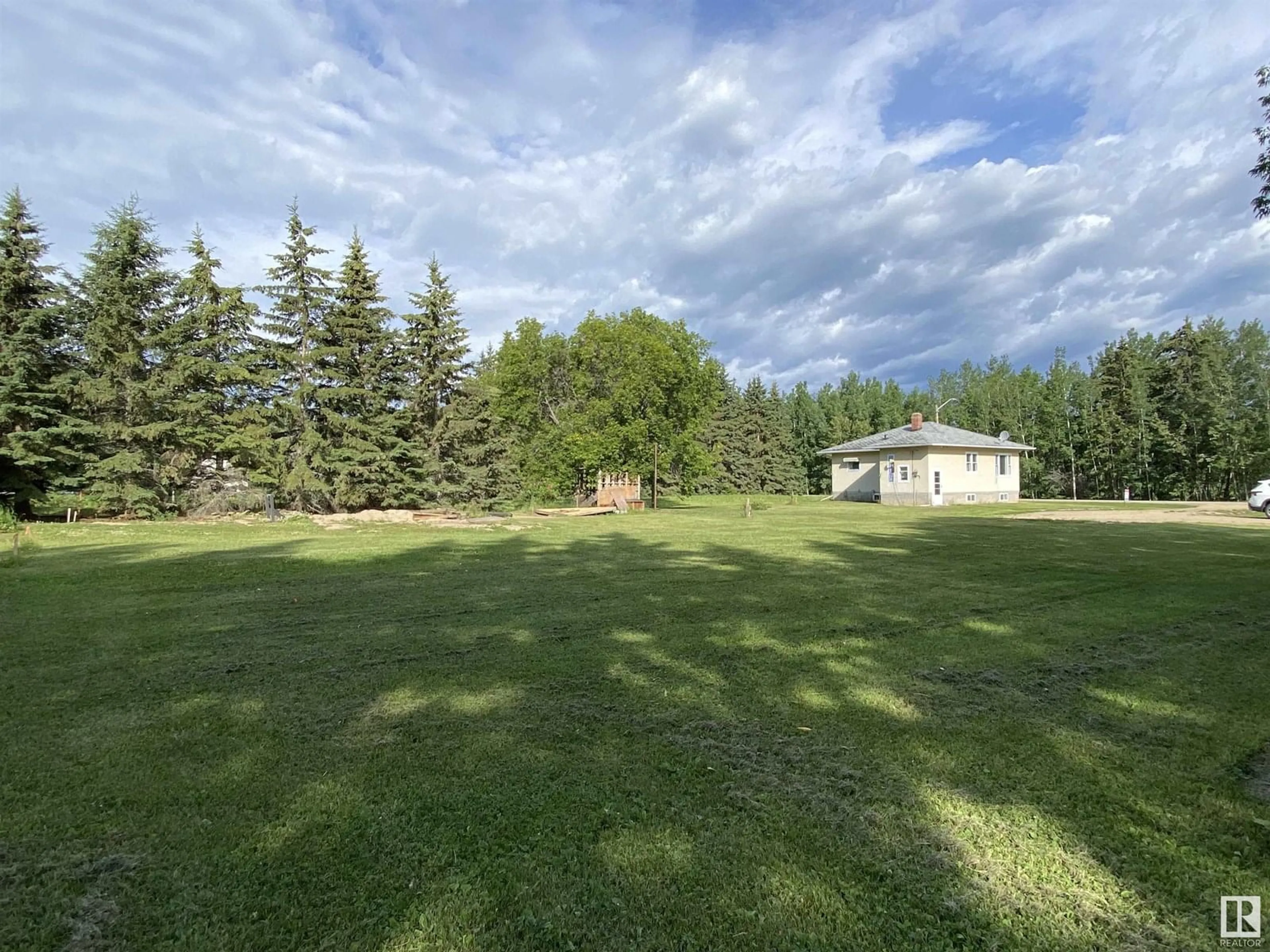 A pic from outside/outdoor area/front of a property/back of a property/a pic from drone, forest/trees view for 49019 - 470 RR 22, Sunnybrook Alberta T0C2M0