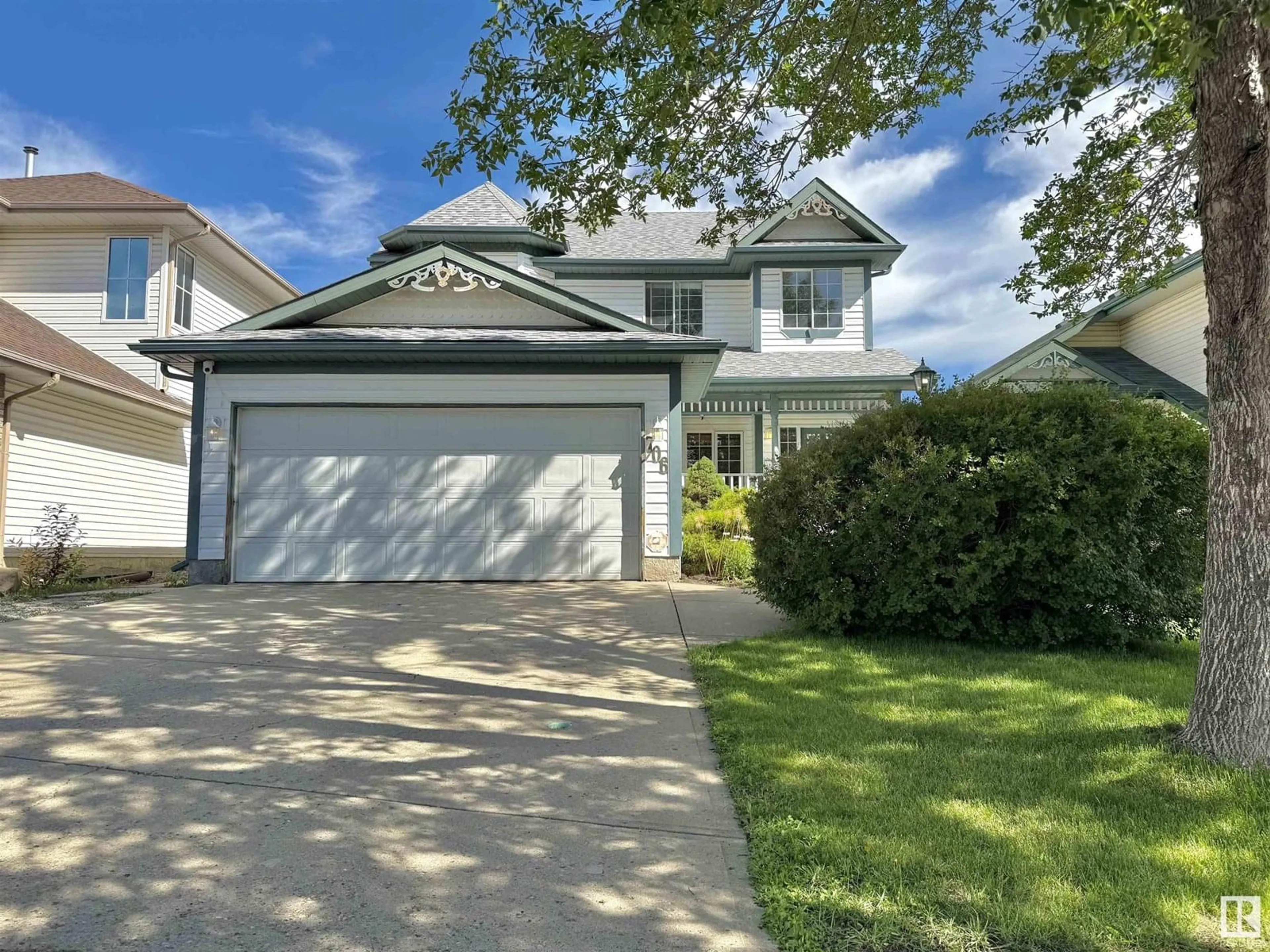 Home with vinyl exterior material, street for 706 ORMSBY ROAD, Edmonton Alberta T5T6E4