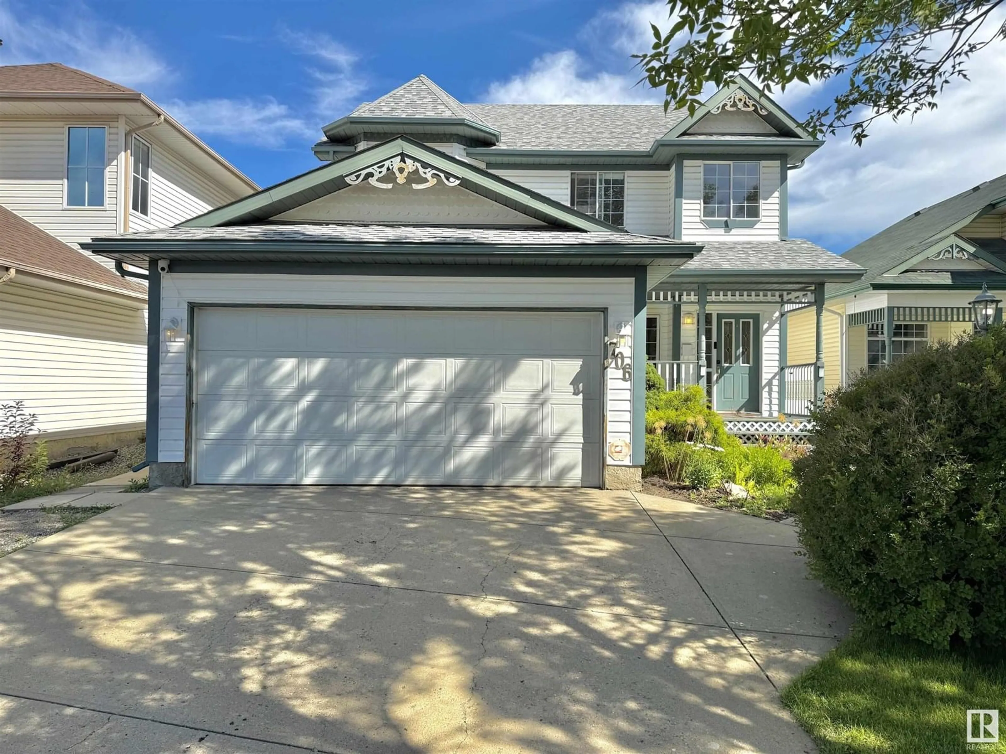 Home with vinyl exterior material, street for 706 ORMSBY ROAD, Edmonton Alberta T5T6E4