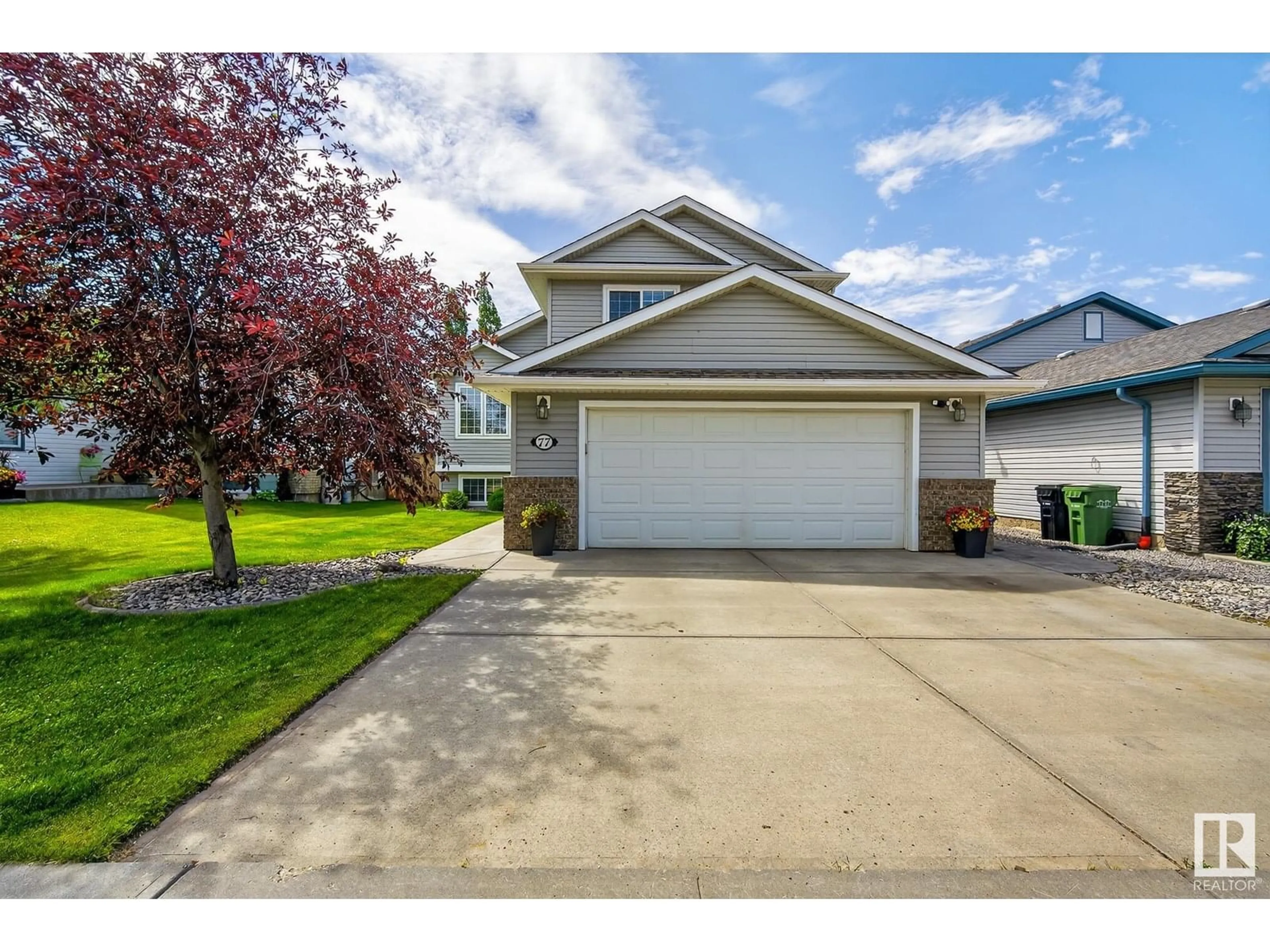 Home with vinyl exterior material, street for 77 WALTERS PL, Leduc Alberta T9E0G2