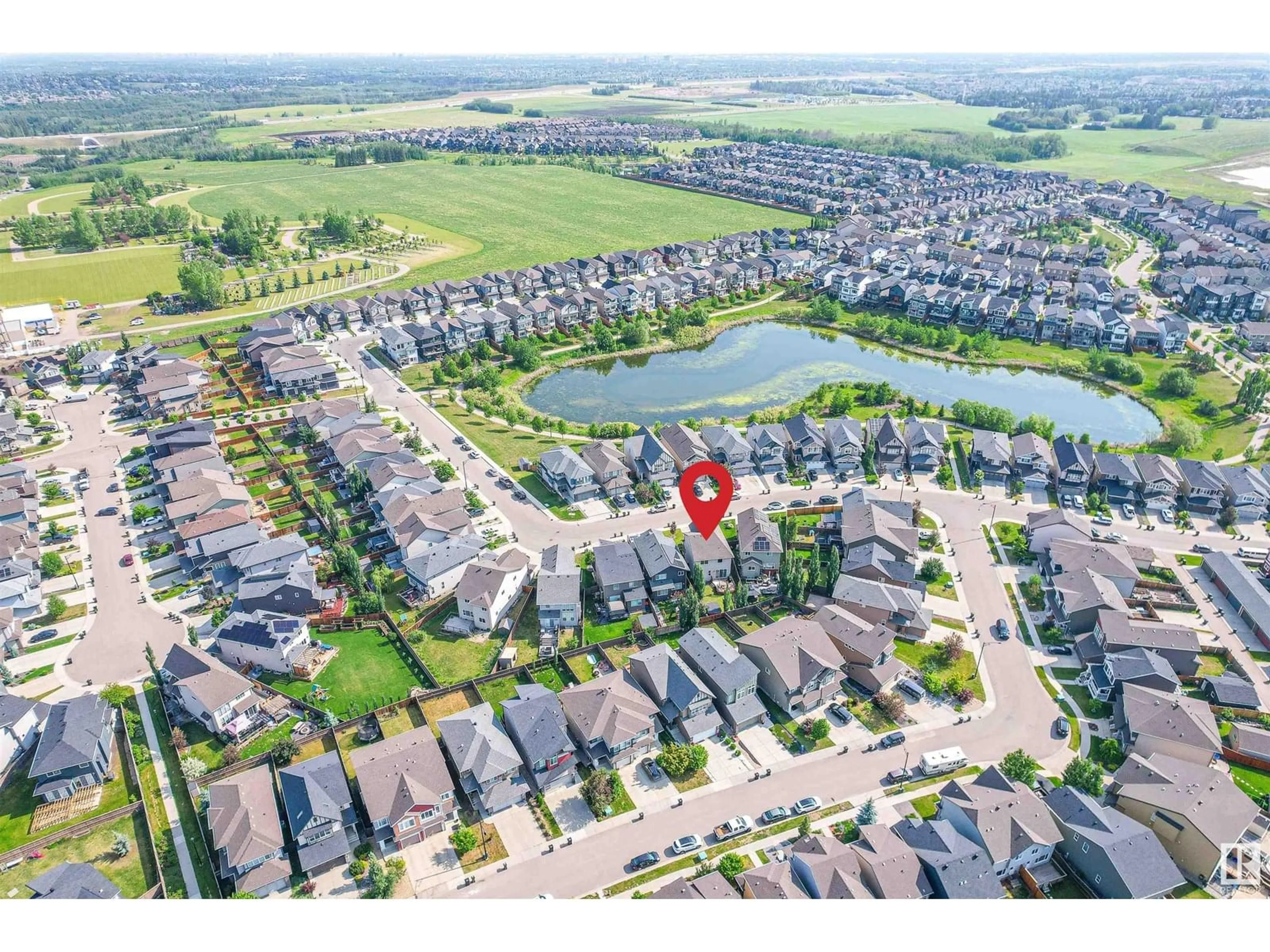 A pic from outside/outdoor area/front of a property/back of a property/a pic from drone, water/lake/river/ocean view for SW - 3411 PARKER LO, Edmonton Alberta T6W3A8