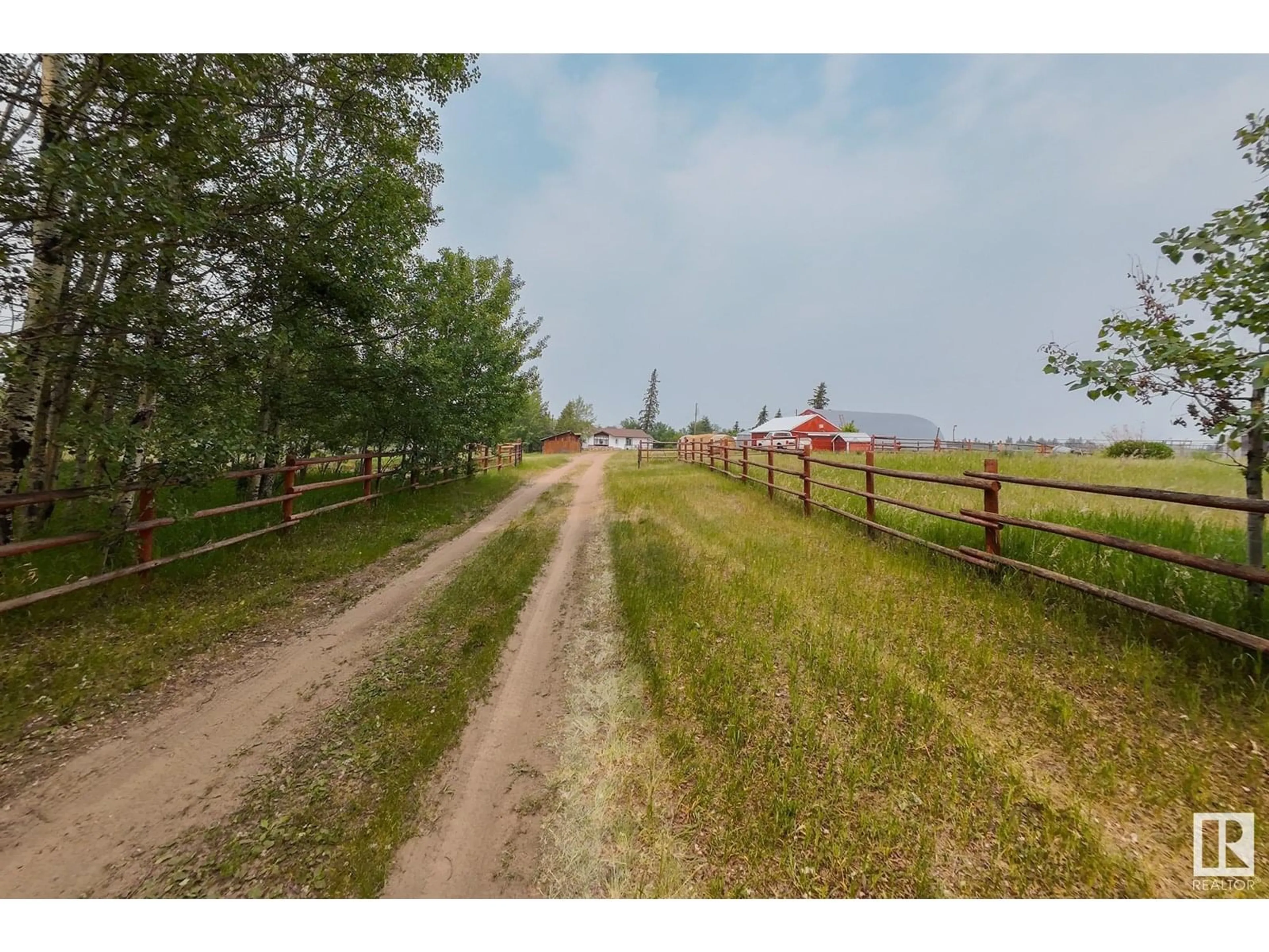 A pic from outside/outdoor area/front of a property/back of a property/a pic from drone, street for 22204 TOWNSHIP ROAD 572, Rural Sturgeon County Alberta T0A1N5