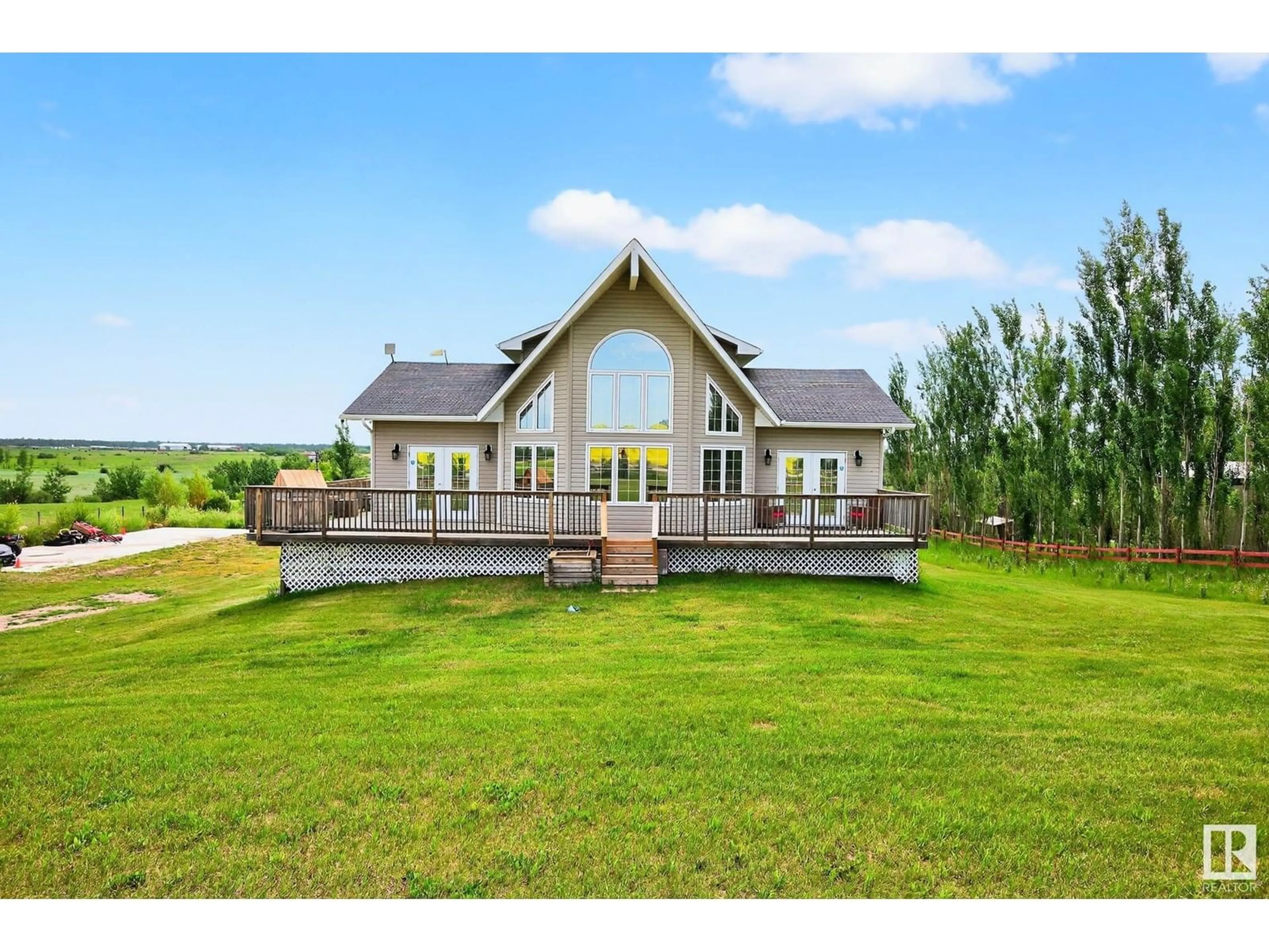 A pic from outside/outdoor area/front of a property/back of a property/a pic from drone, unknown for 57517 - 11 LILY LAKE RD, Rural Sturgeon County Alberta T0G1L2