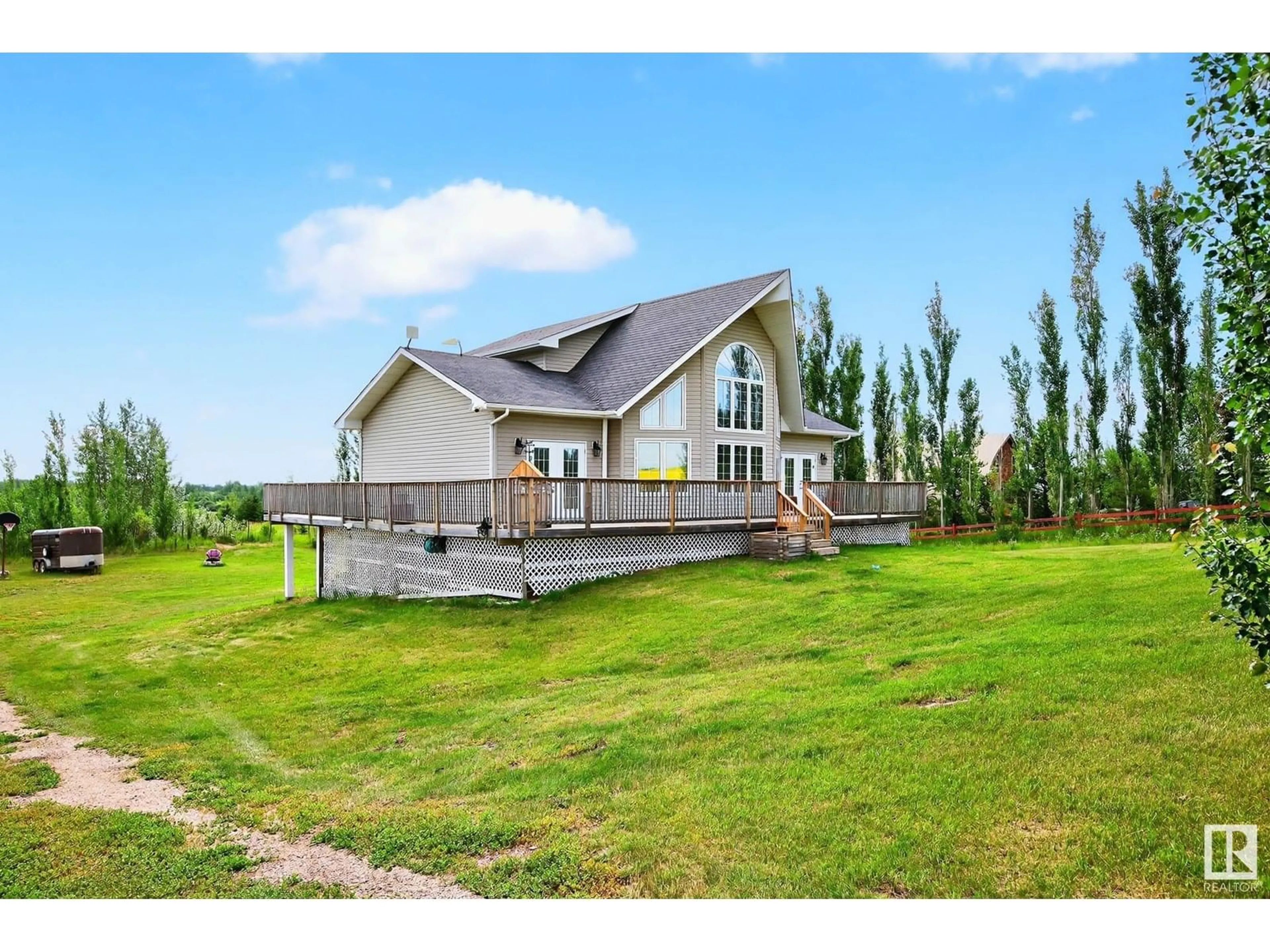 A pic from outside/outdoor area/front of a property/back of a property/a pic from drone, unknown for 57517 - 11 LILY LAKE RD, Rural Sturgeon County Alberta T0G1L2