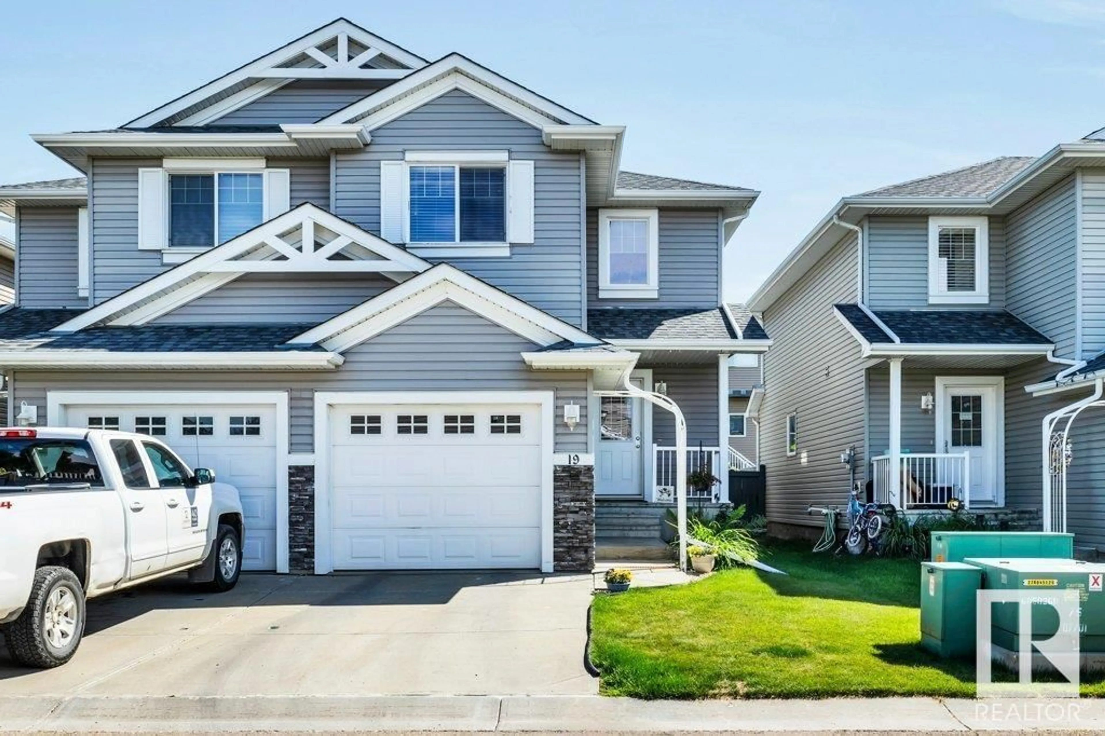 Home with vinyl exterior material, street for 19 5101 SOLEIL BV, Beaumont Alberta T4X0E3