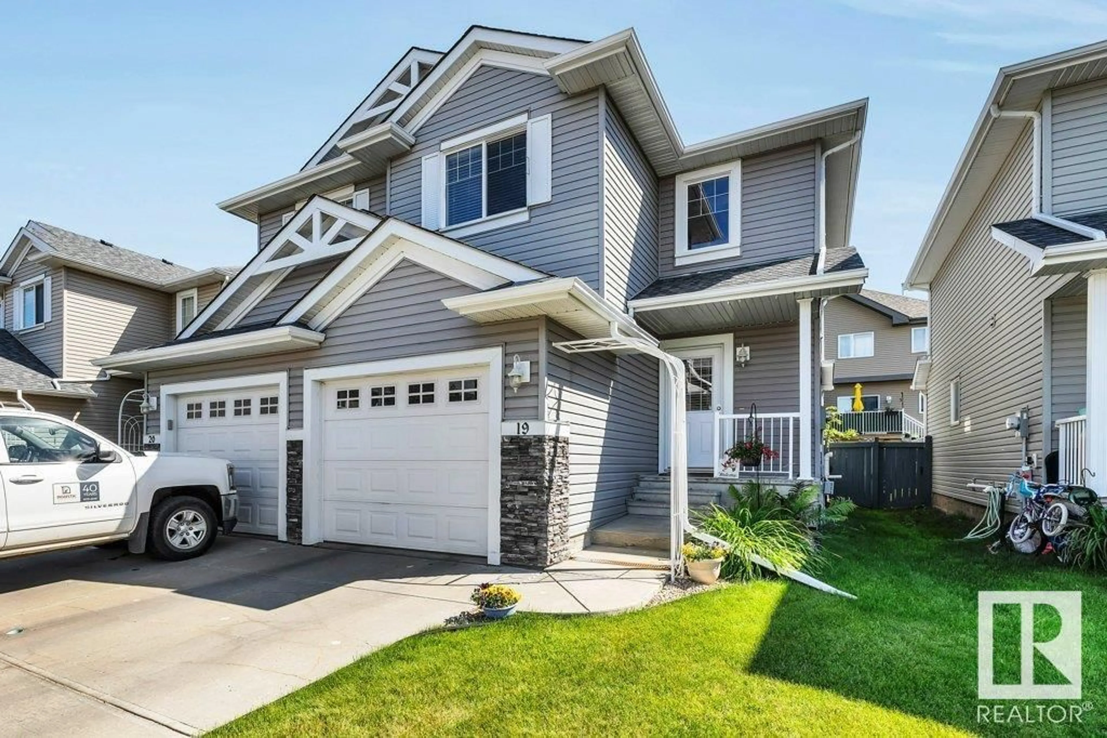 Home with vinyl exterior material, street for 19 5101 SOLEIL BV, Beaumont Alberta T4X0E3
