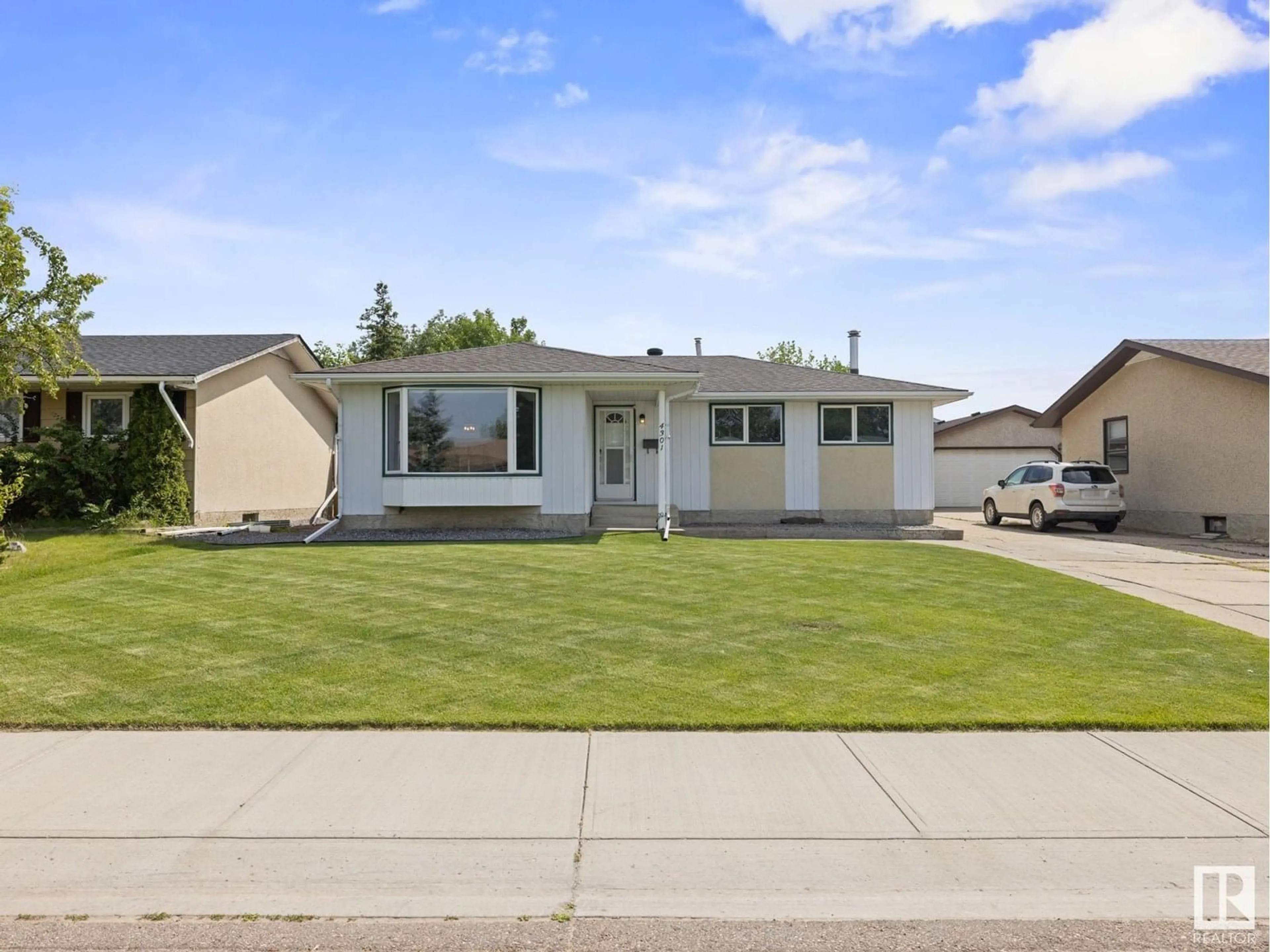 Home with vinyl exterior material, street for 4301 37 AV, Leduc Alberta T9E5Z9