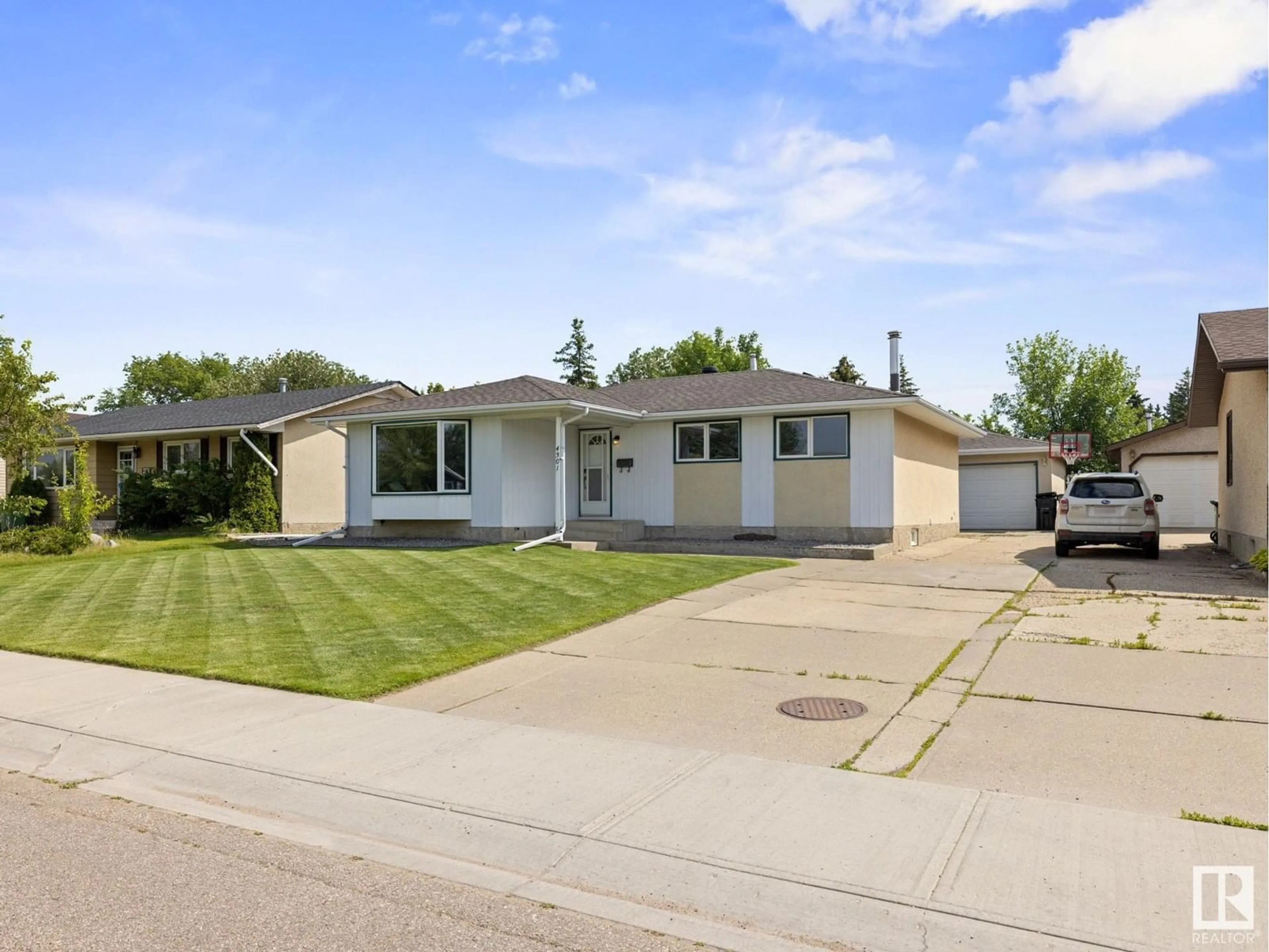 Home with vinyl exterior material, street for 4301 37 AV, Leduc Alberta T9E5Z9