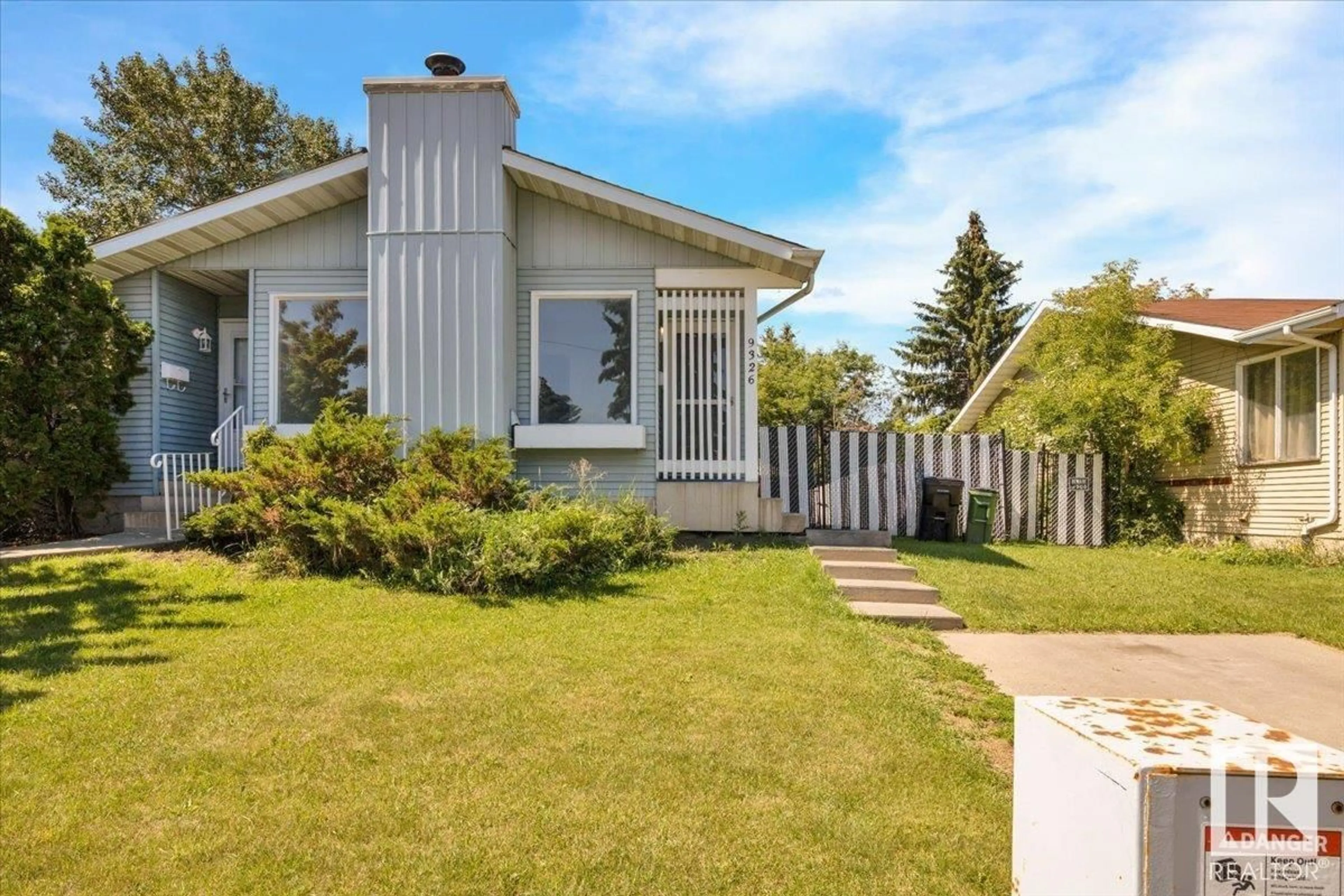 Home with vinyl exterior material, street for 9326 172 ST, Edmonton Alberta T5T3G2