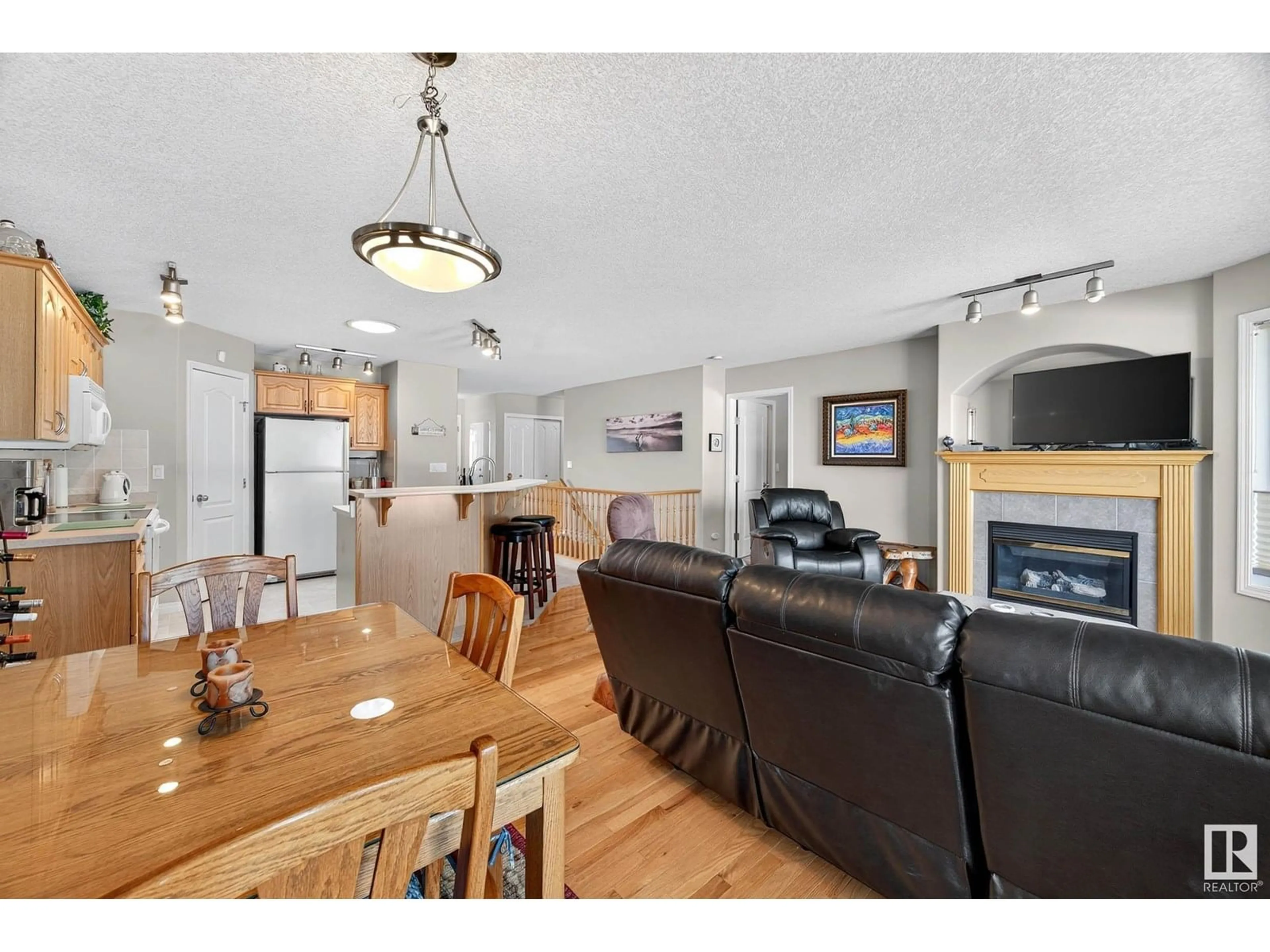 Open concept kitchen, wood/laminate floor for #25 - 16415 77 ST, Edmonton Alberta T5Z3S8