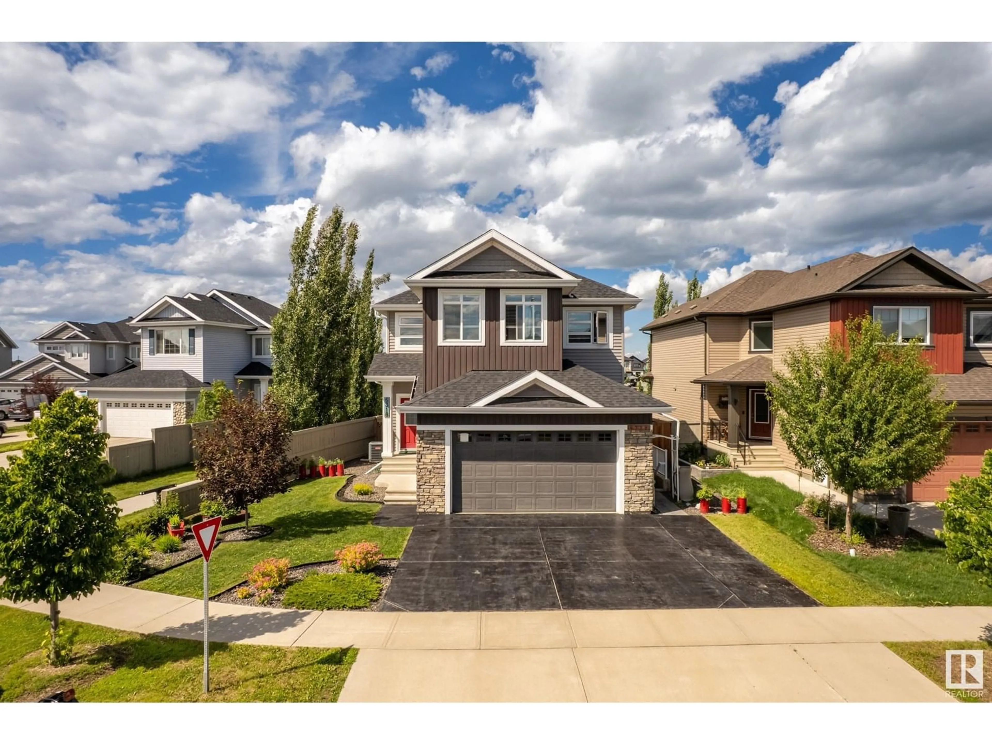 Home with vinyl exterior material, street for 6318 61 AV, Beaumont Alberta T4X1Z2