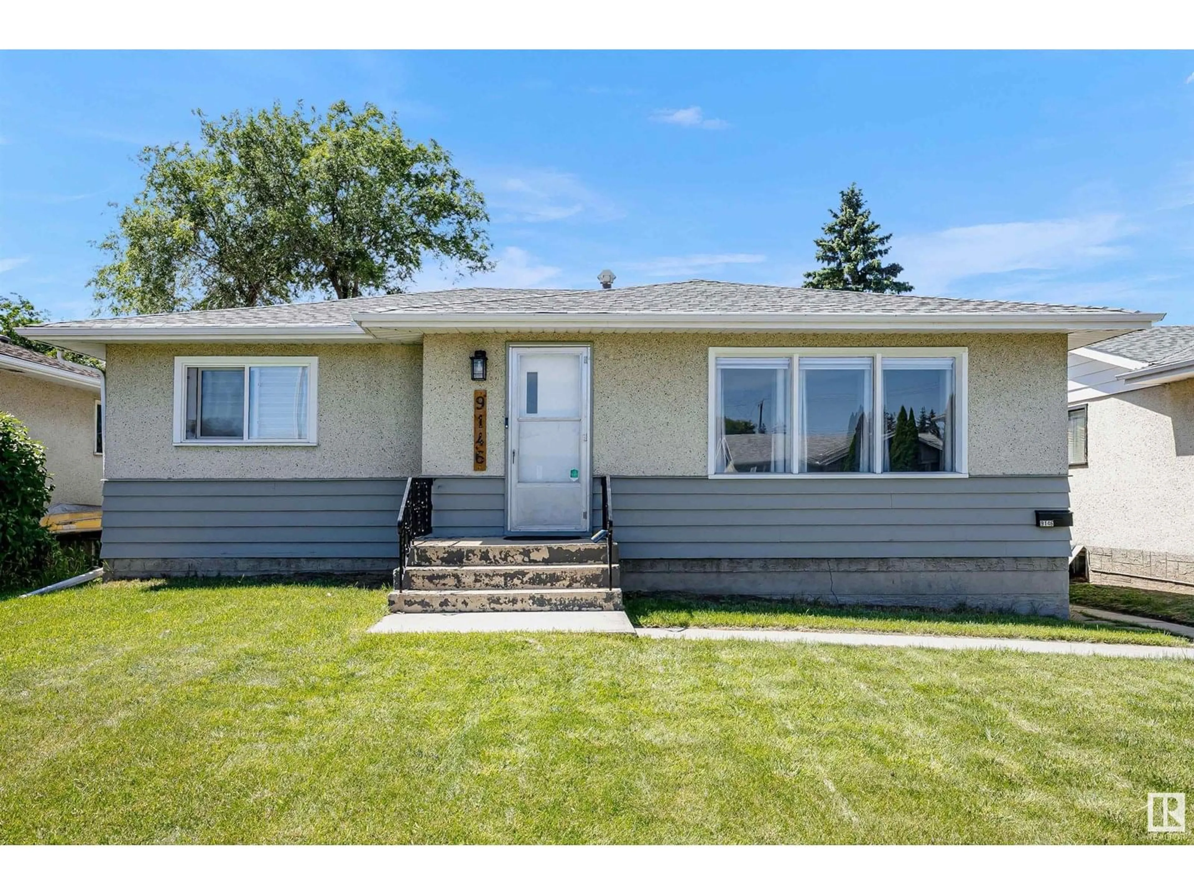 Home with vinyl exterior material, street for NW - 9146 152 ST, Edmonton Alberta T5R1M4