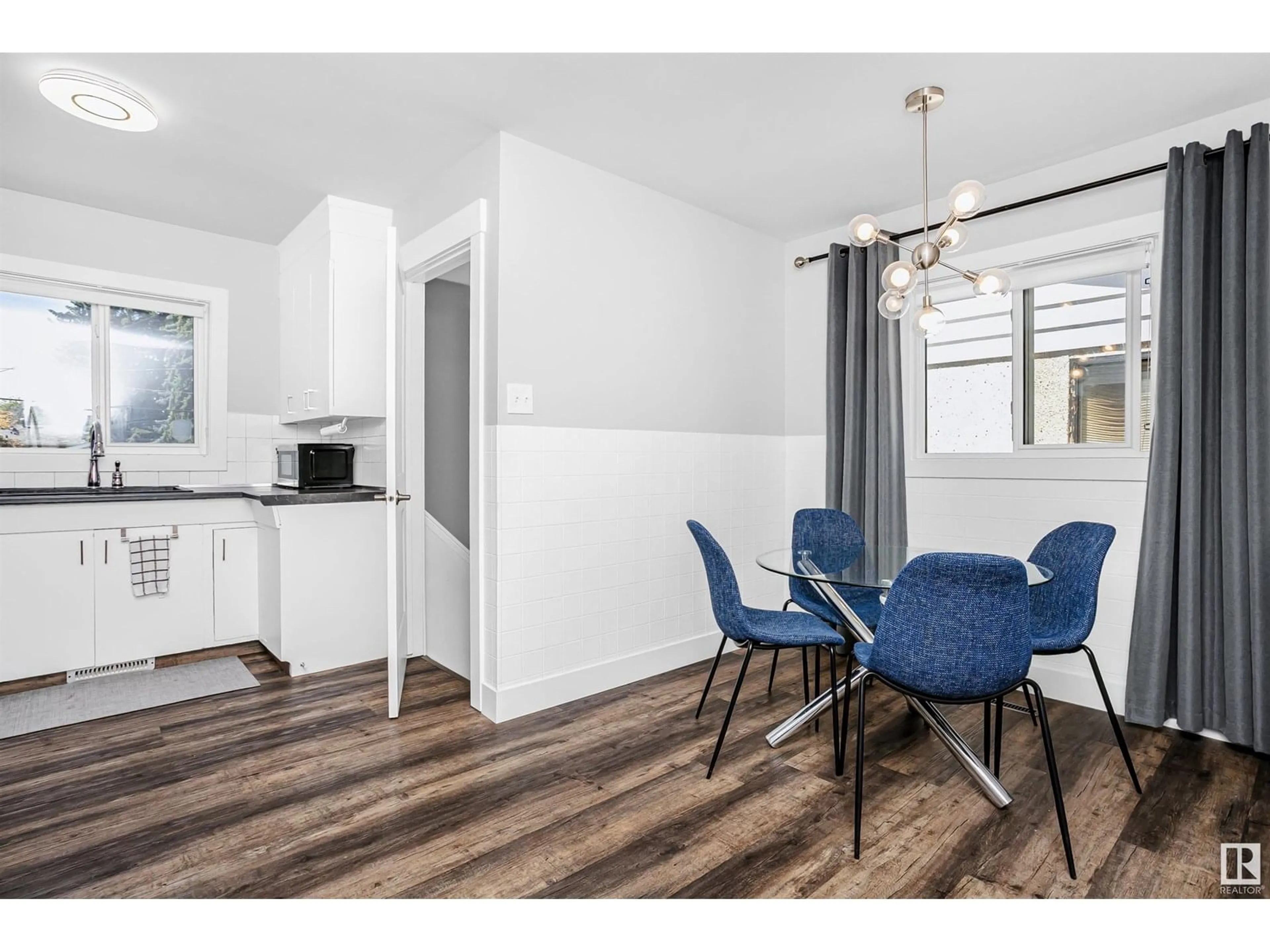 Open concept kitchen, wood/laminate floor for NW - 9146 152 ST, Edmonton Alberta T5R1M4