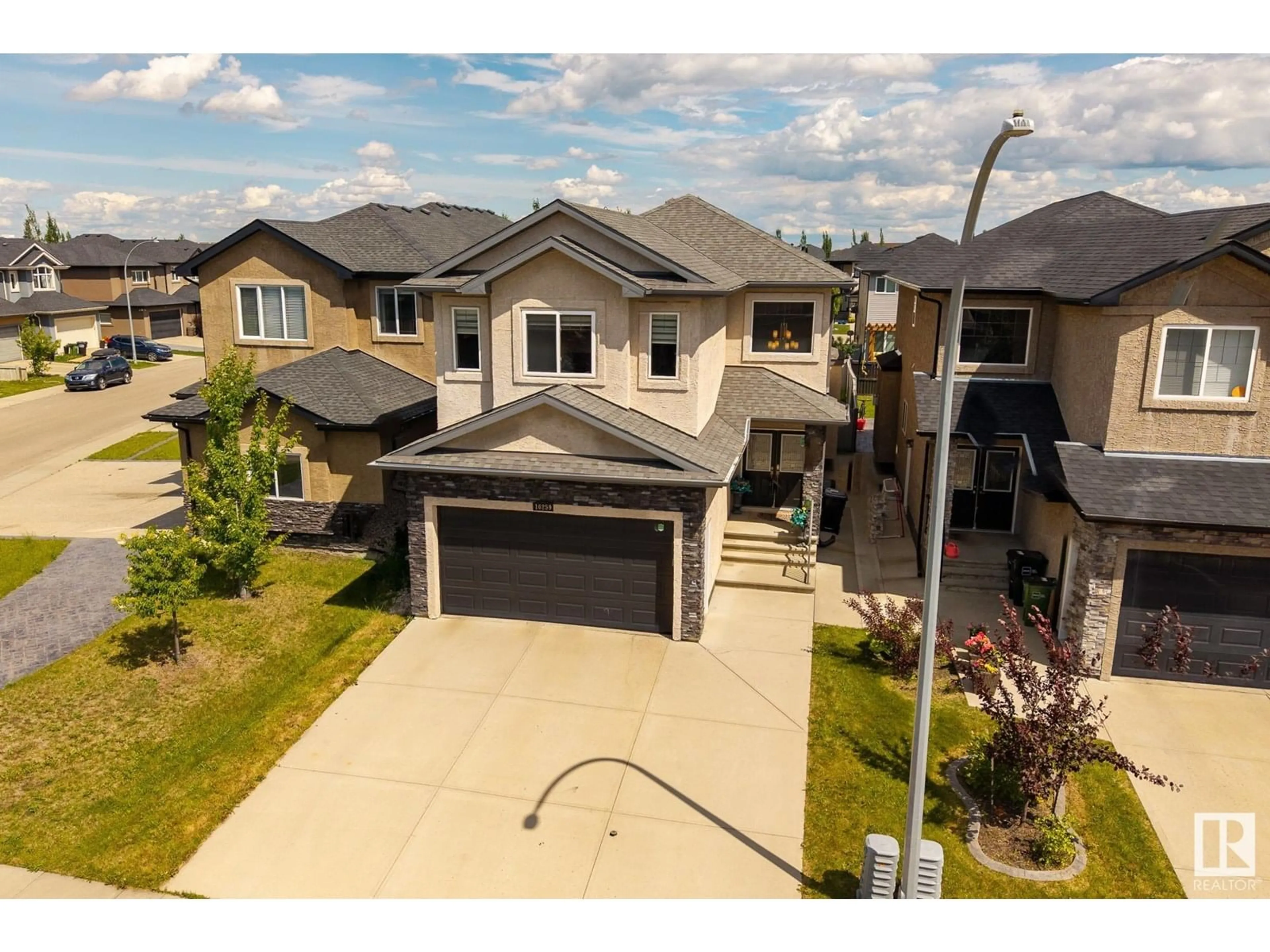 A pic from outside/outdoor area/front of a property/back of a property/a pic from drone, street for 16259 137 ST, Edmonton Alberta T6V0J7