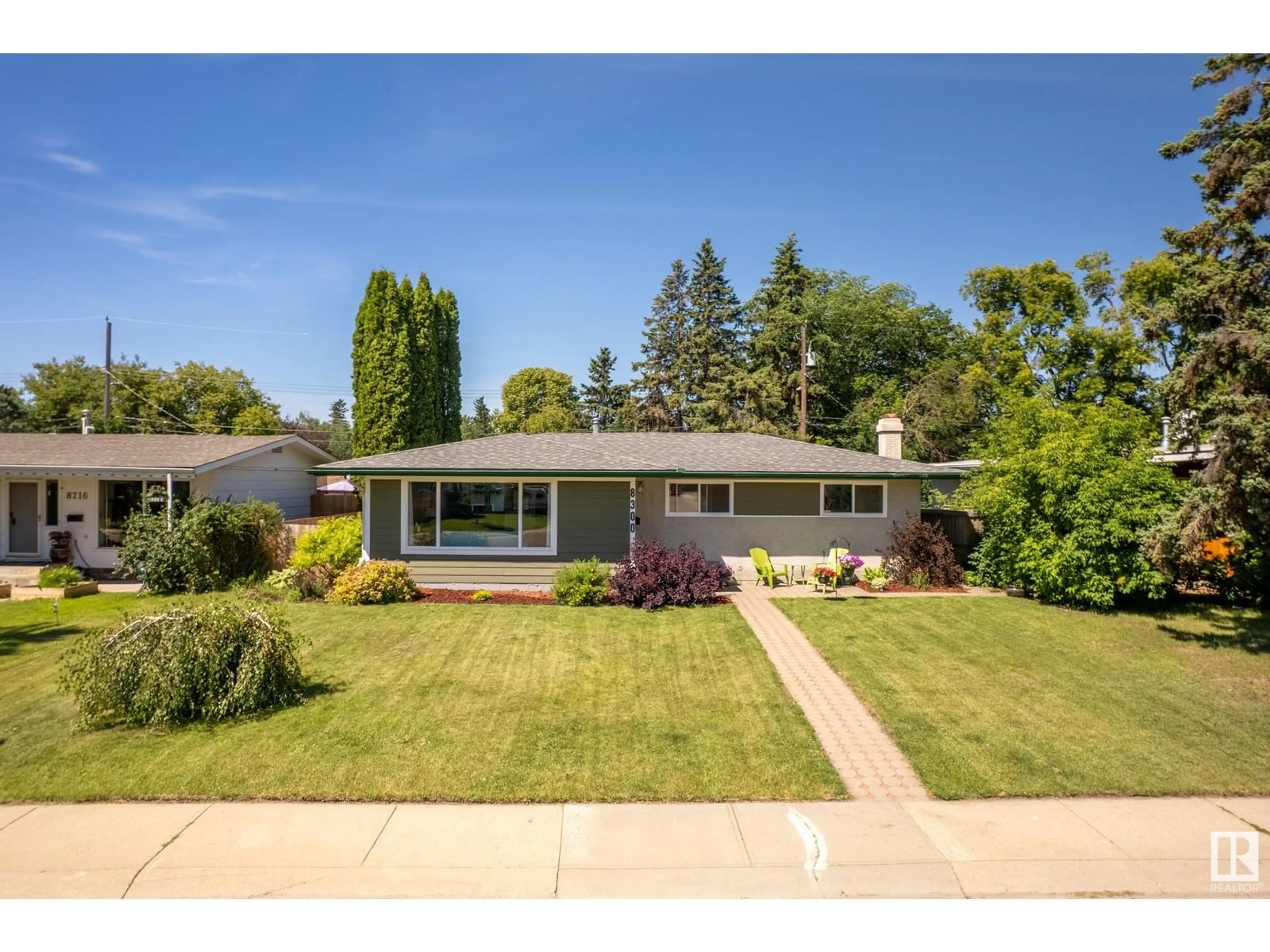 Home with vinyl exterior material, street for 8300 151 ST, Edmonton Alberta T5R1H6