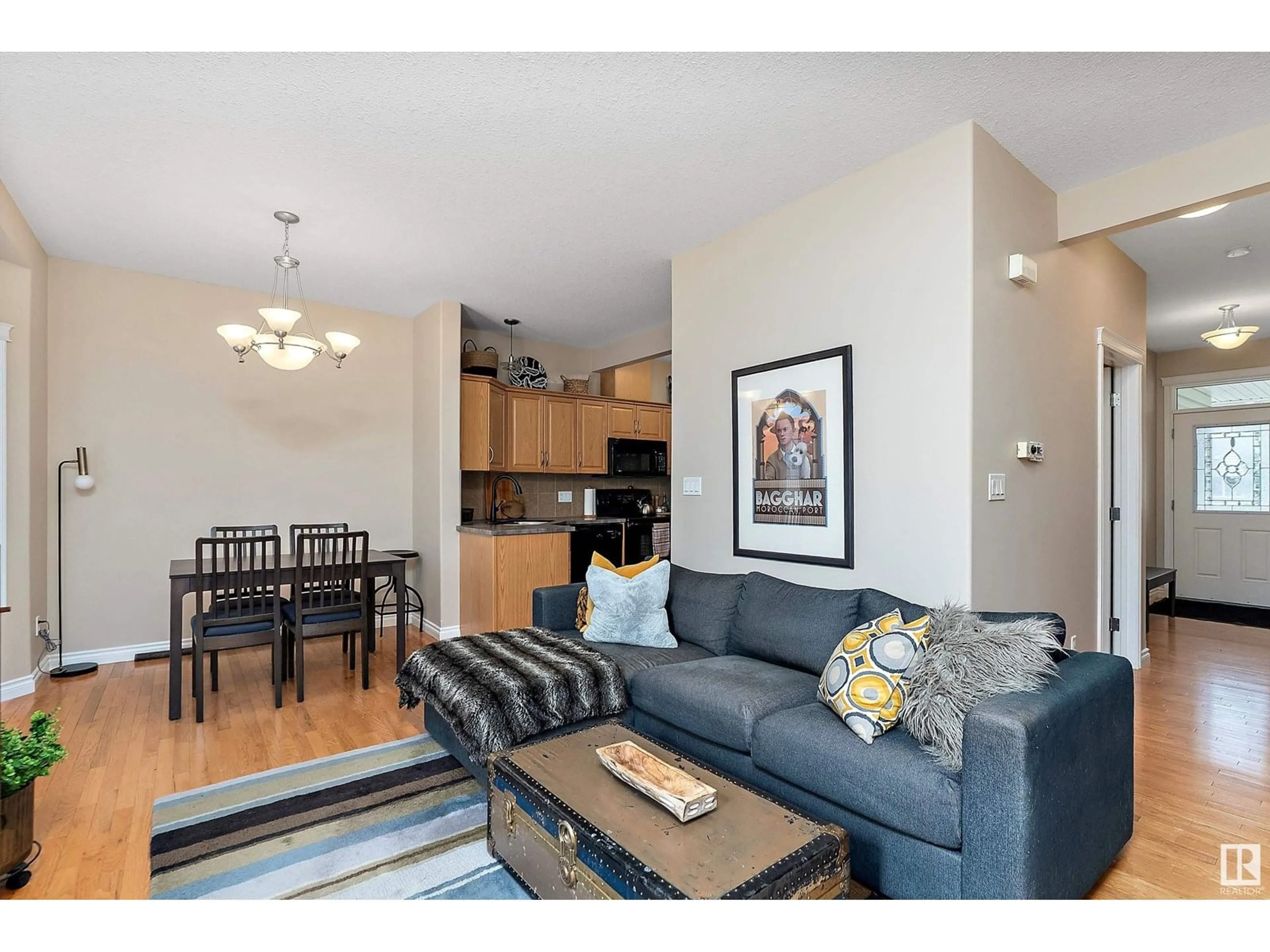 Living room with furniture, wood/laminate floor for #103 - 102 WEST HAVEN DR, Leduc Alberta T9E0A2