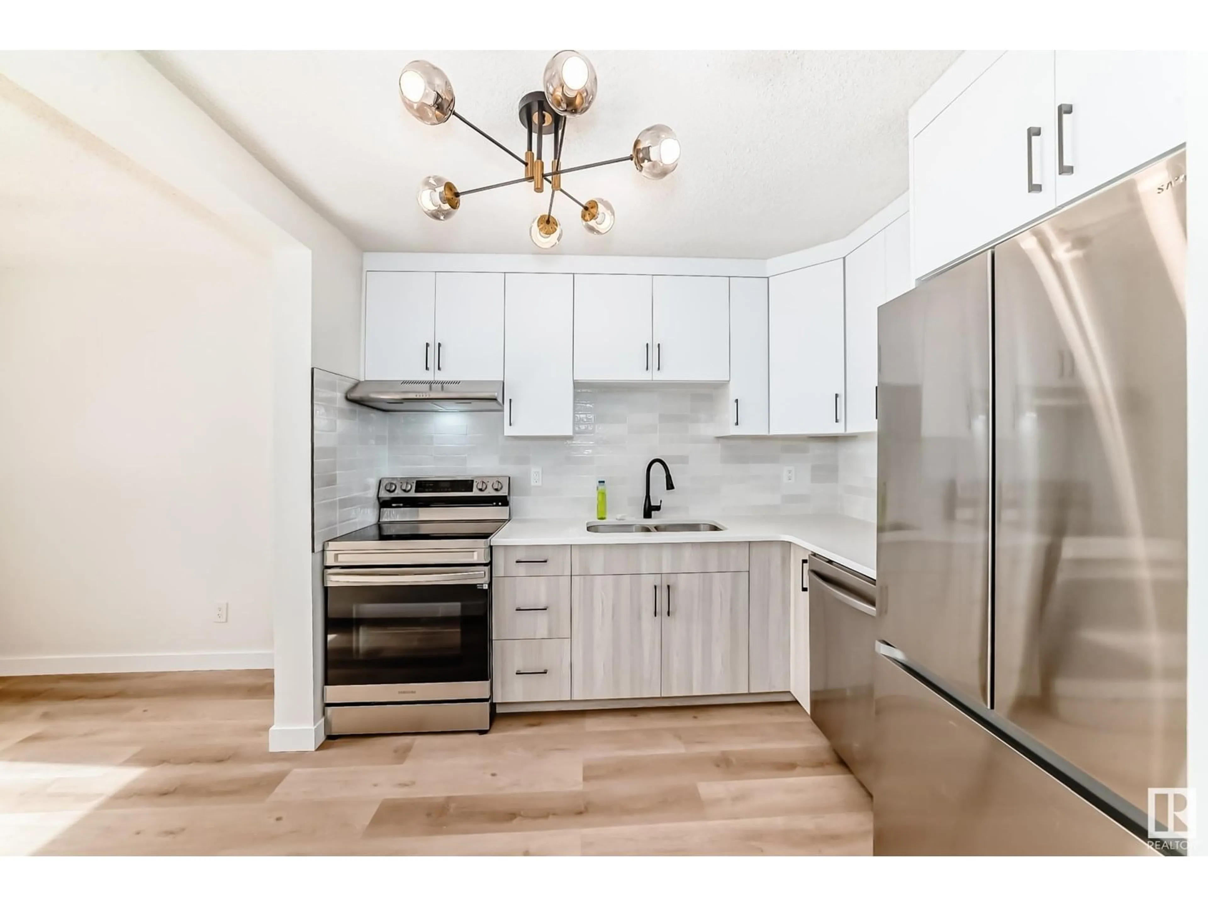 Open concept kitchen, unknown for 14233 23 ST, Edmonton Alberta T5Y1E8
