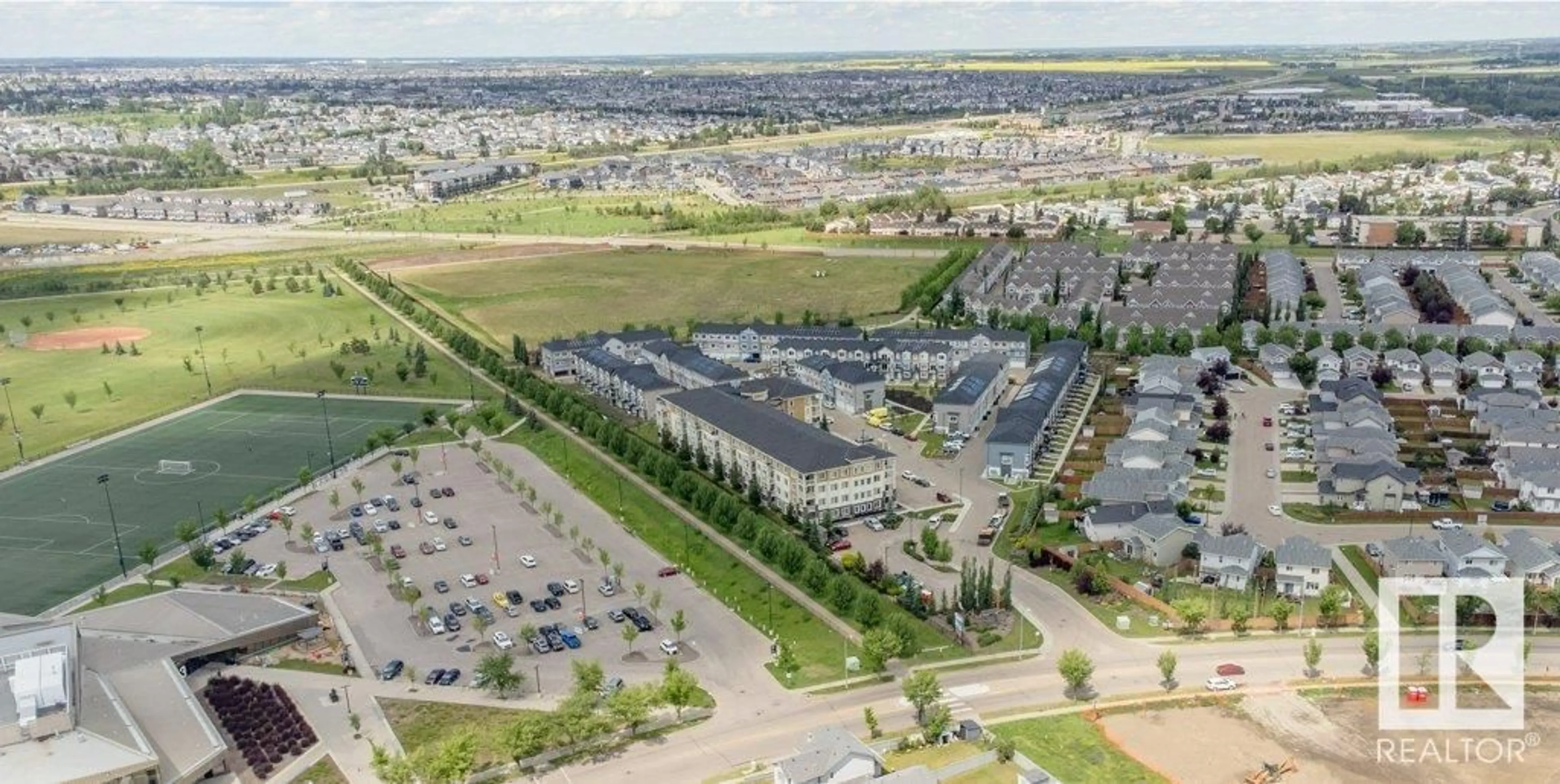 A pic from outside/outdoor area/front of a property/back of a property/a pic from drone, unknown for 207 - 3670 139 AV, Edmonton Alberta T5Y3N5