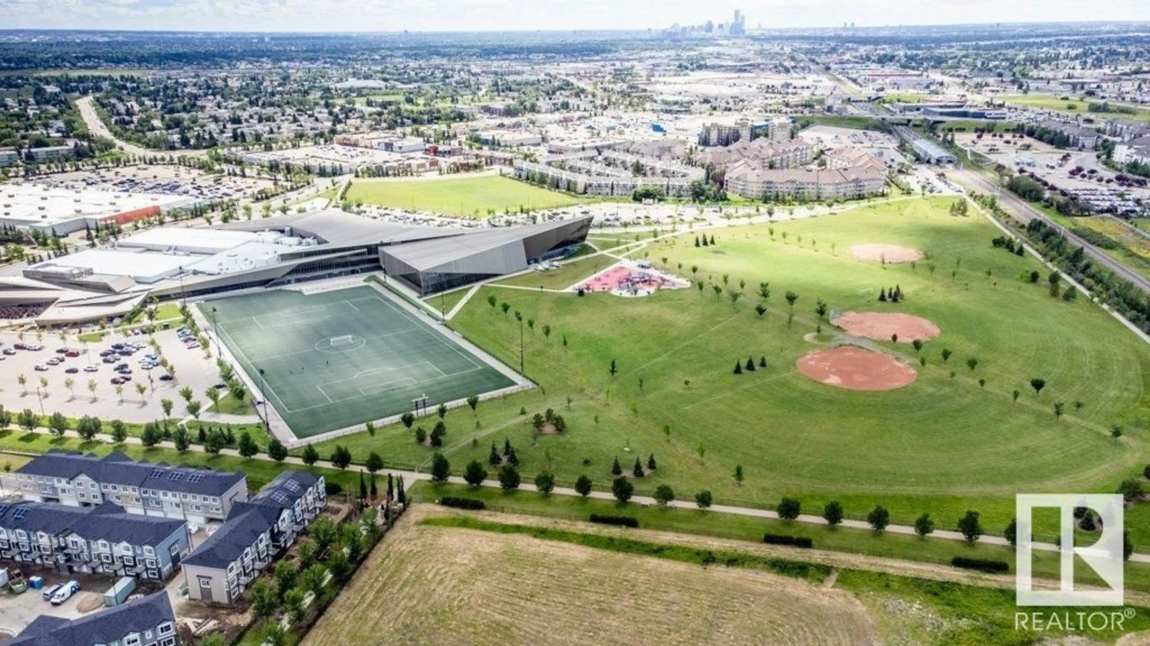 A pic from outside/outdoor area/front of a property/back of a property/a pic from drone, unknown for 207 - 3670 139 AV, Edmonton Alberta T5Y3N5