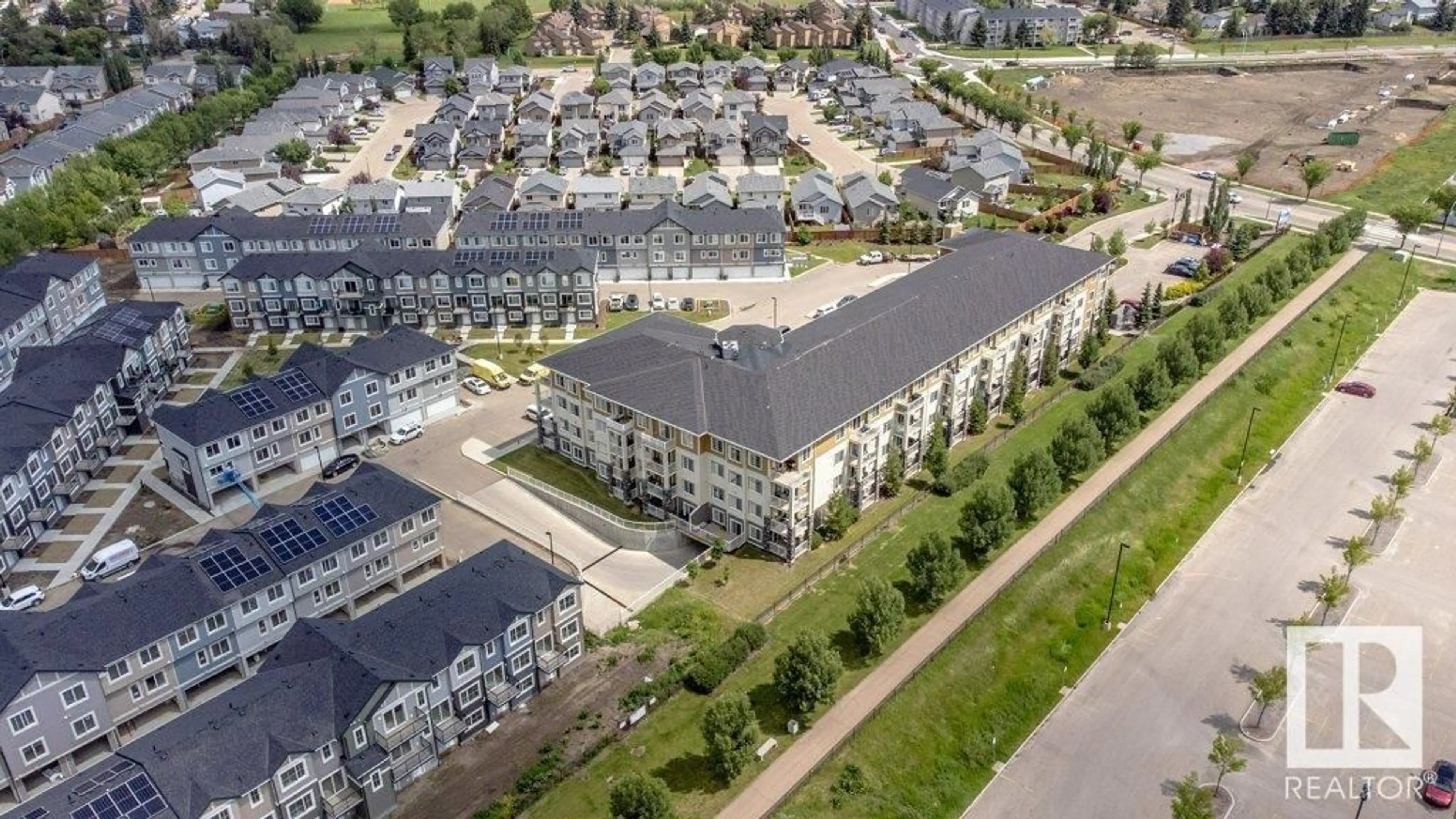 A pic from outside/outdoor area/front of a property/back of a property/a pic from drone, unknown for 207 - 3670 139 AV, Edmonton Alberta T5Y3N5