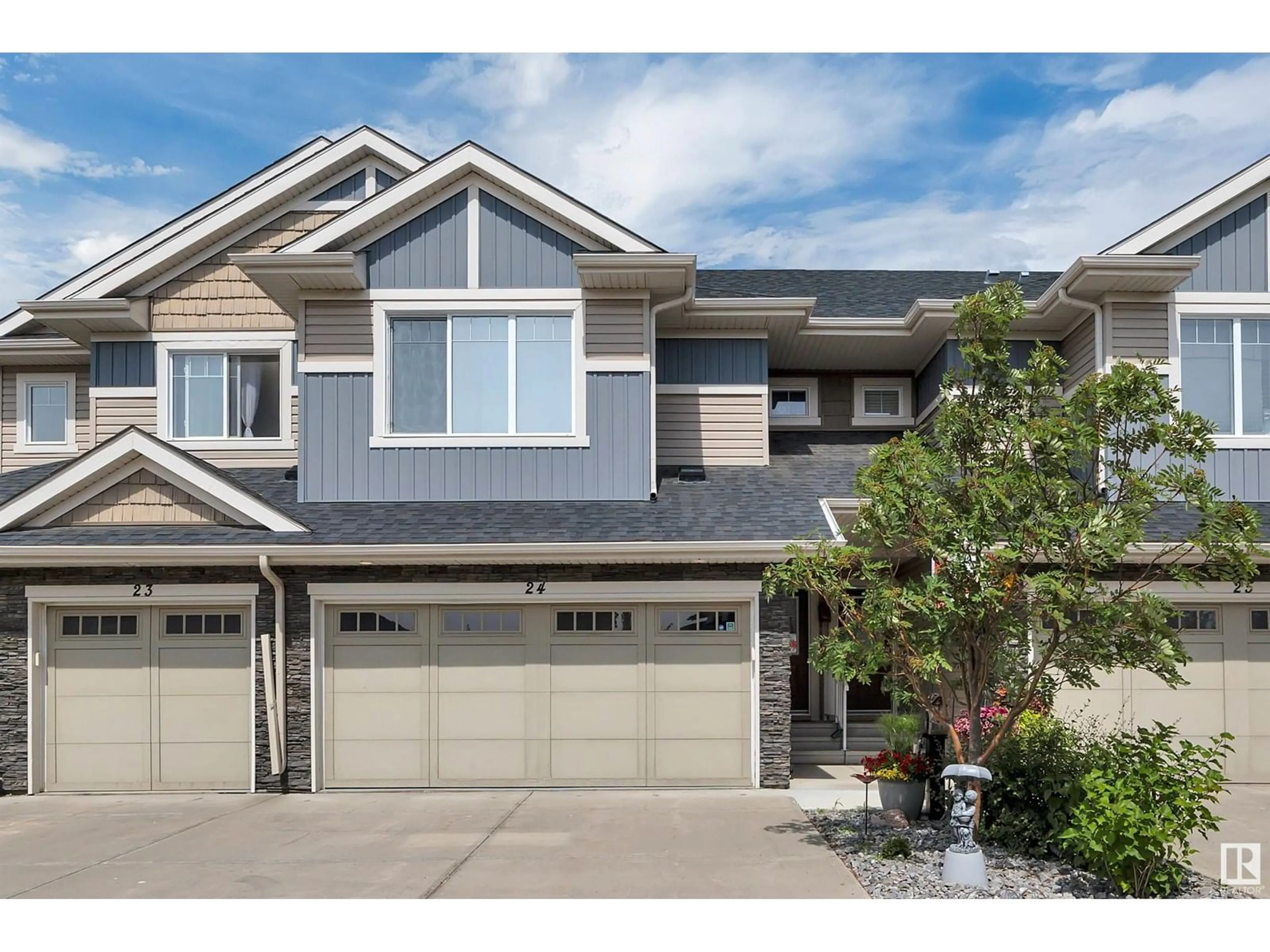 Home with vinyl exterior material, street for 2004 - 24 TUMPETER WY, Edmonton Alberta T5S0J9