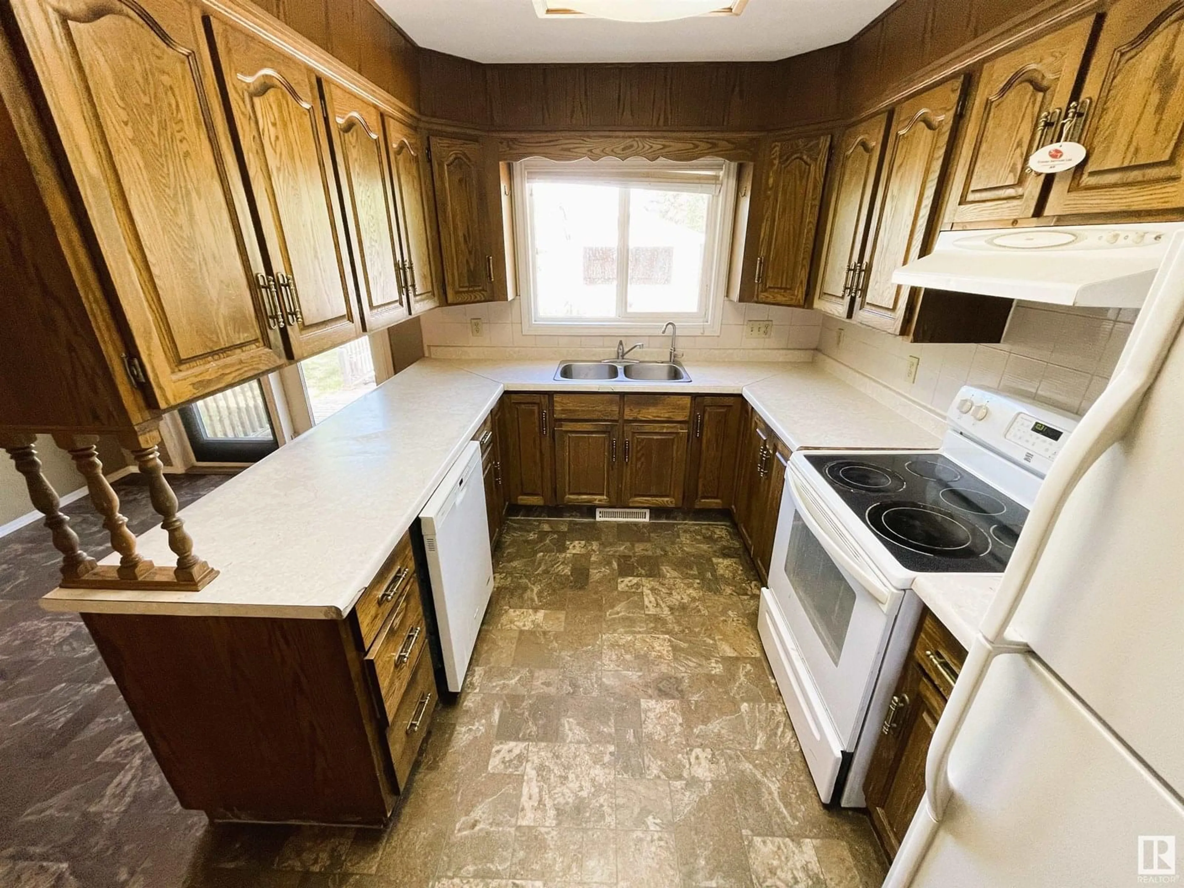 Standard kitchen, ceramic/tile floor for 4818 49 ST, Glendon Alberta T0A1P0