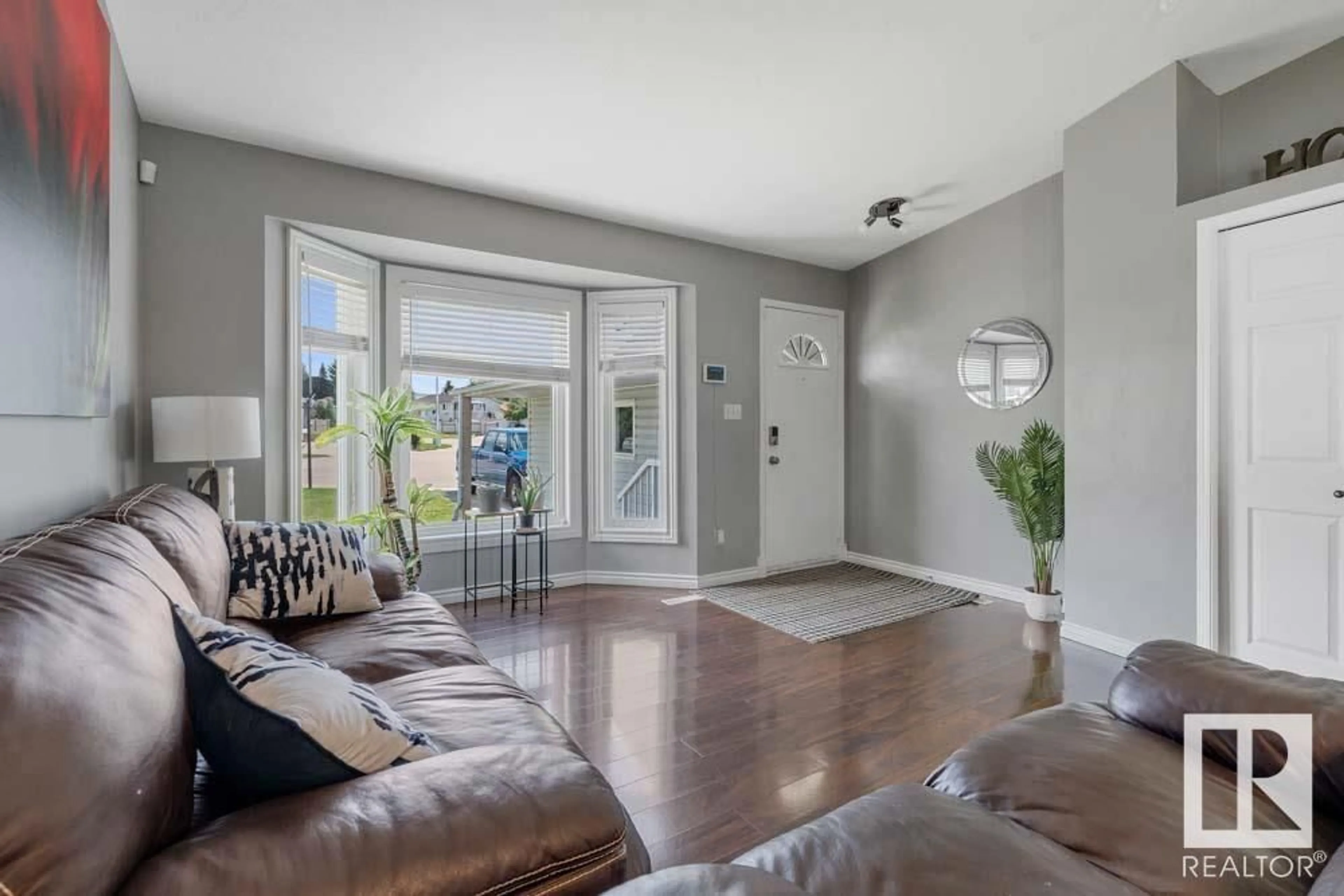 Living room with furniture, unknown for 4712 27 AV, Edmonton Alberta T6L4P9