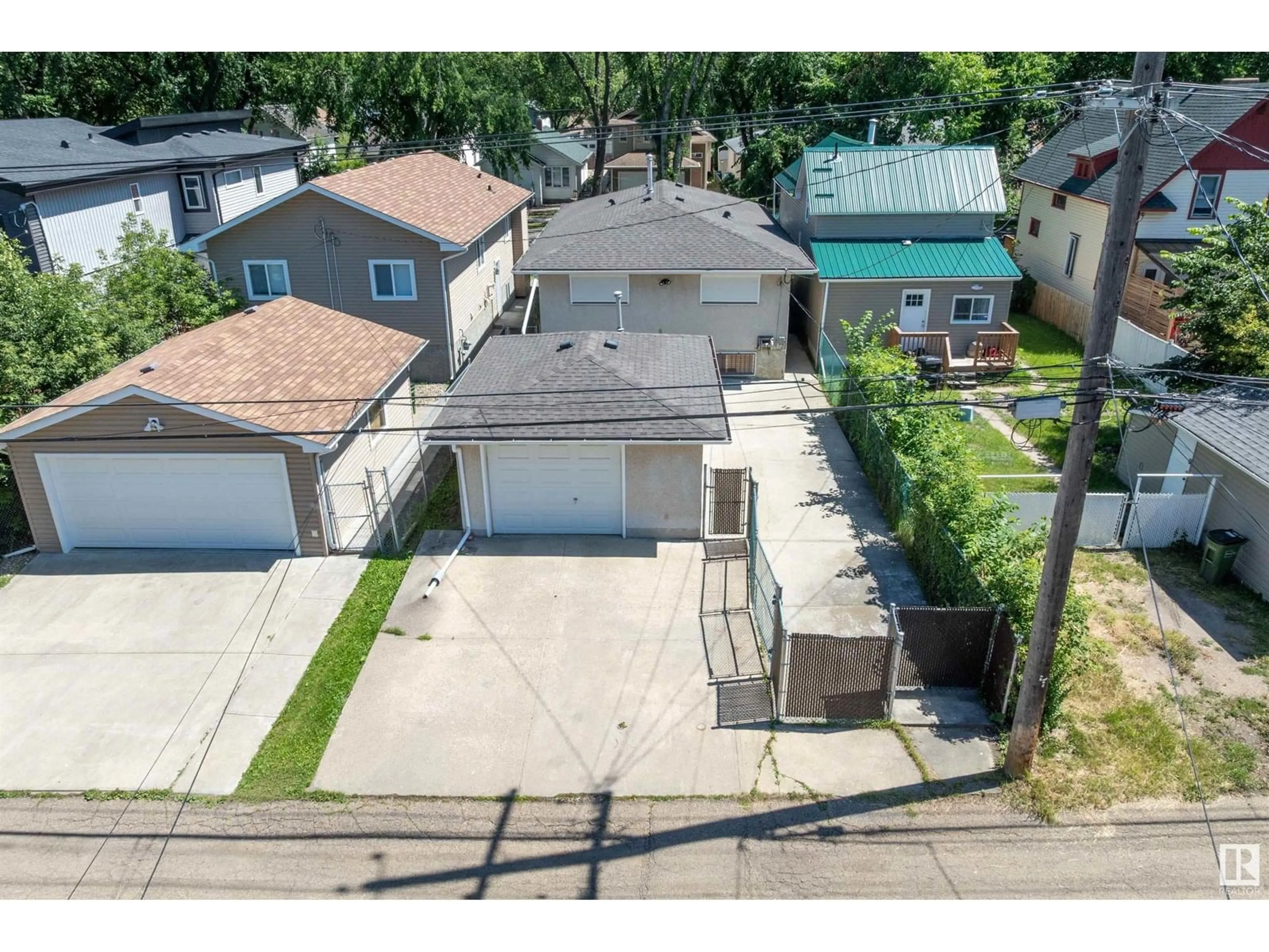 A pic from outside/outdoor area/front of a property/back of a property/a pic from drone, street for NW - 11326 90 ST, Edmonton Alberta T5B3X5