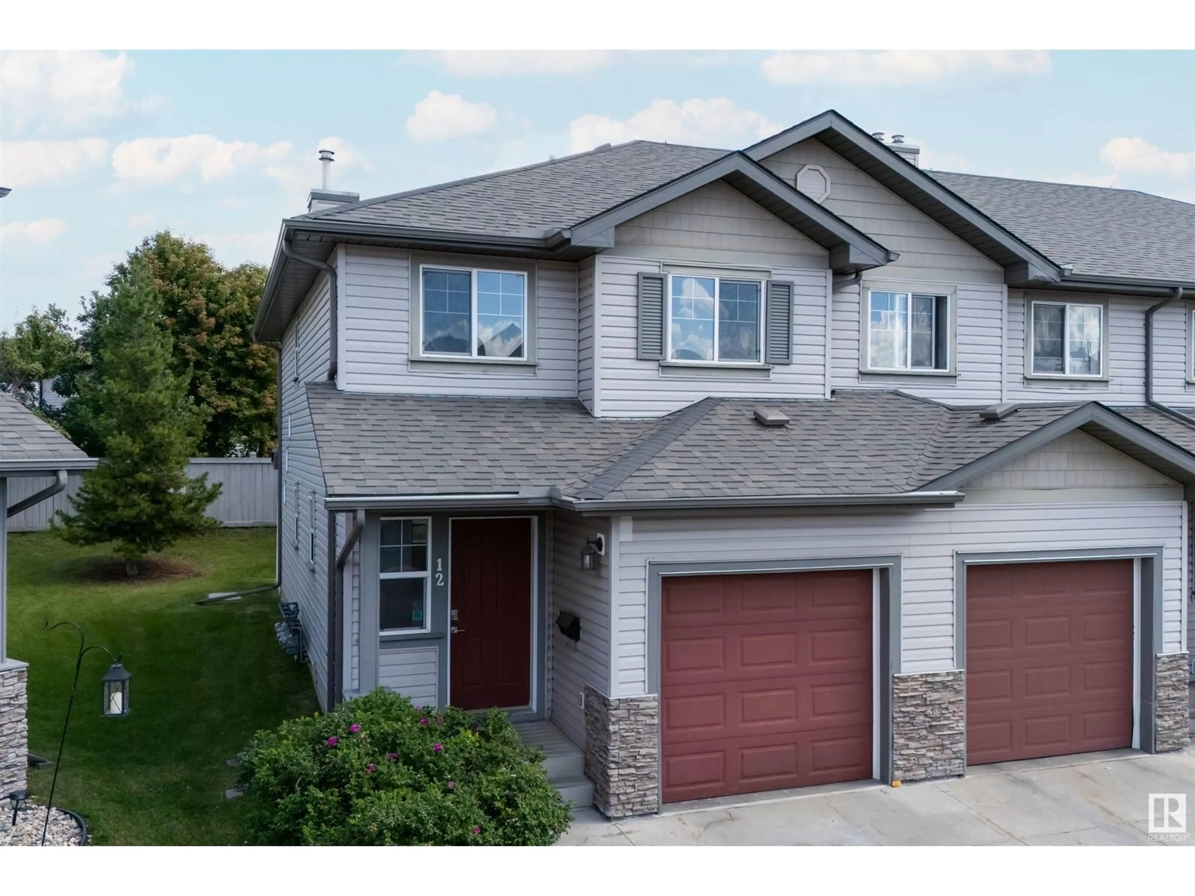 Home with vinyl exterior material, street for #12 - 2816 34 AV, Edmonton Alberta T6T2B4
