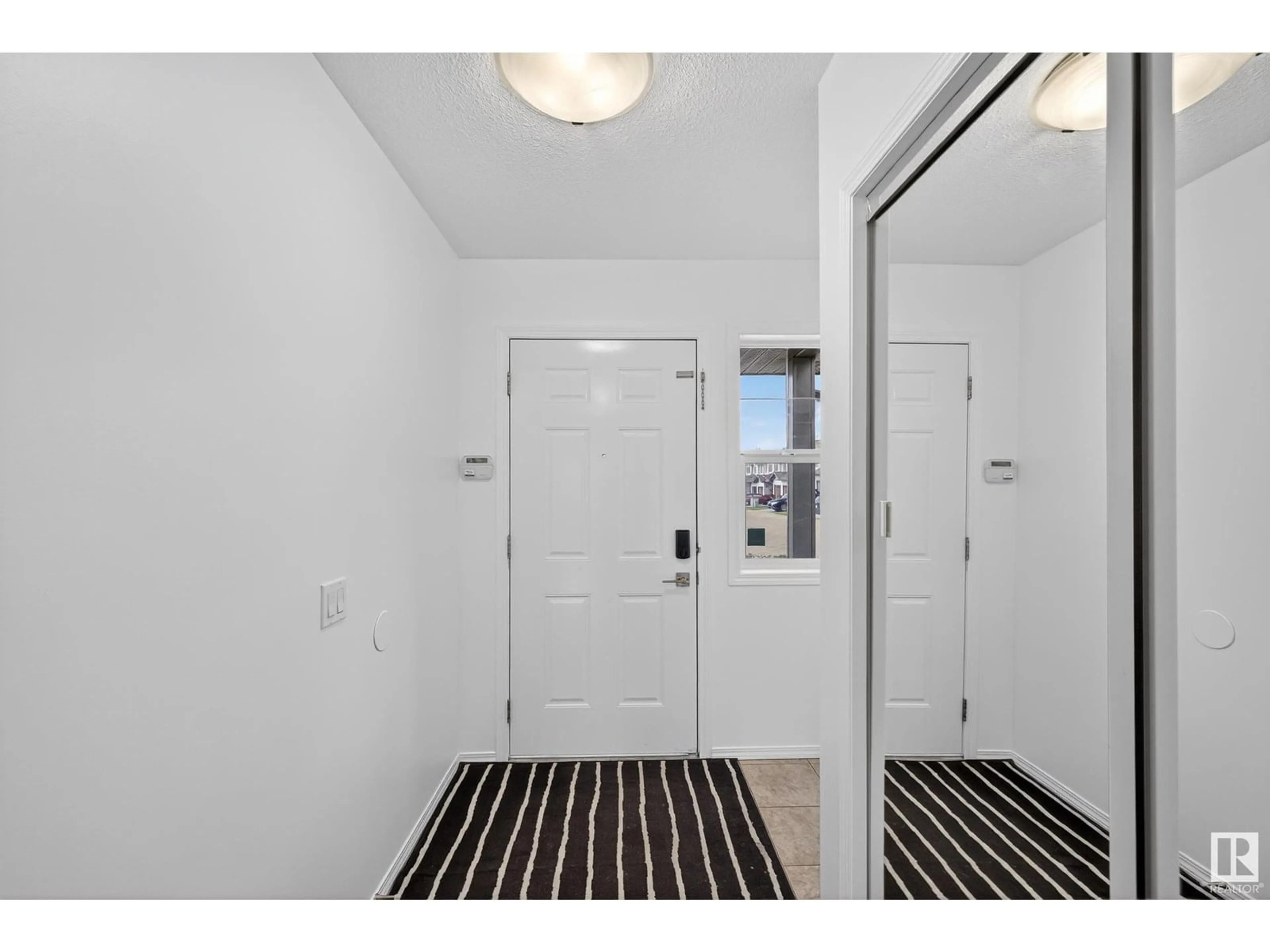 Indoor entryway for #12 - 2816 34 AV, Edmonton Alberta T6T2B4