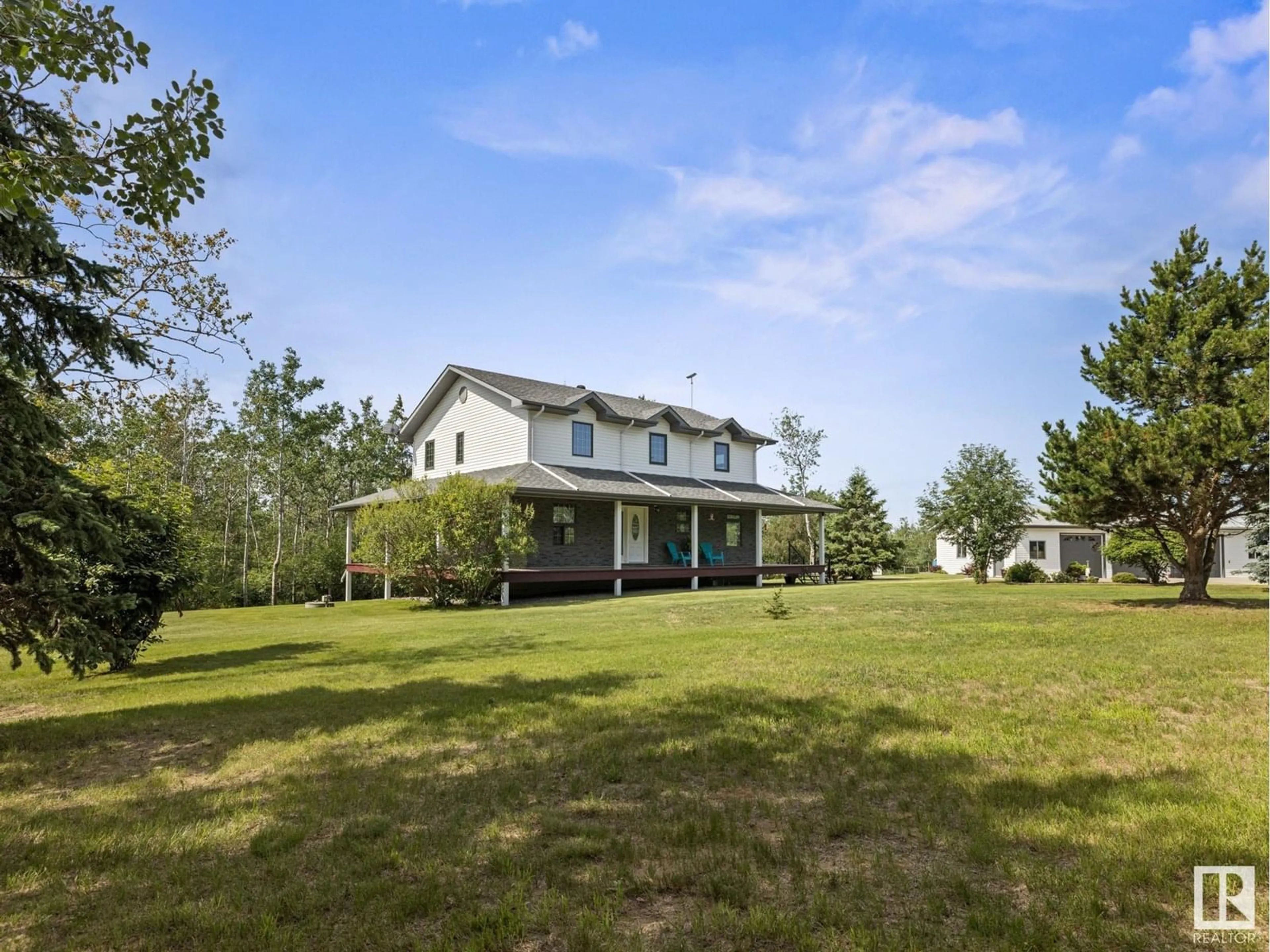 A pic from outside/outdoor area/front of a property/back of a property/a pic from drone, unknown for 20456 TWP ROAD 544, Rural Strathcona County Alberta T8L3Z3