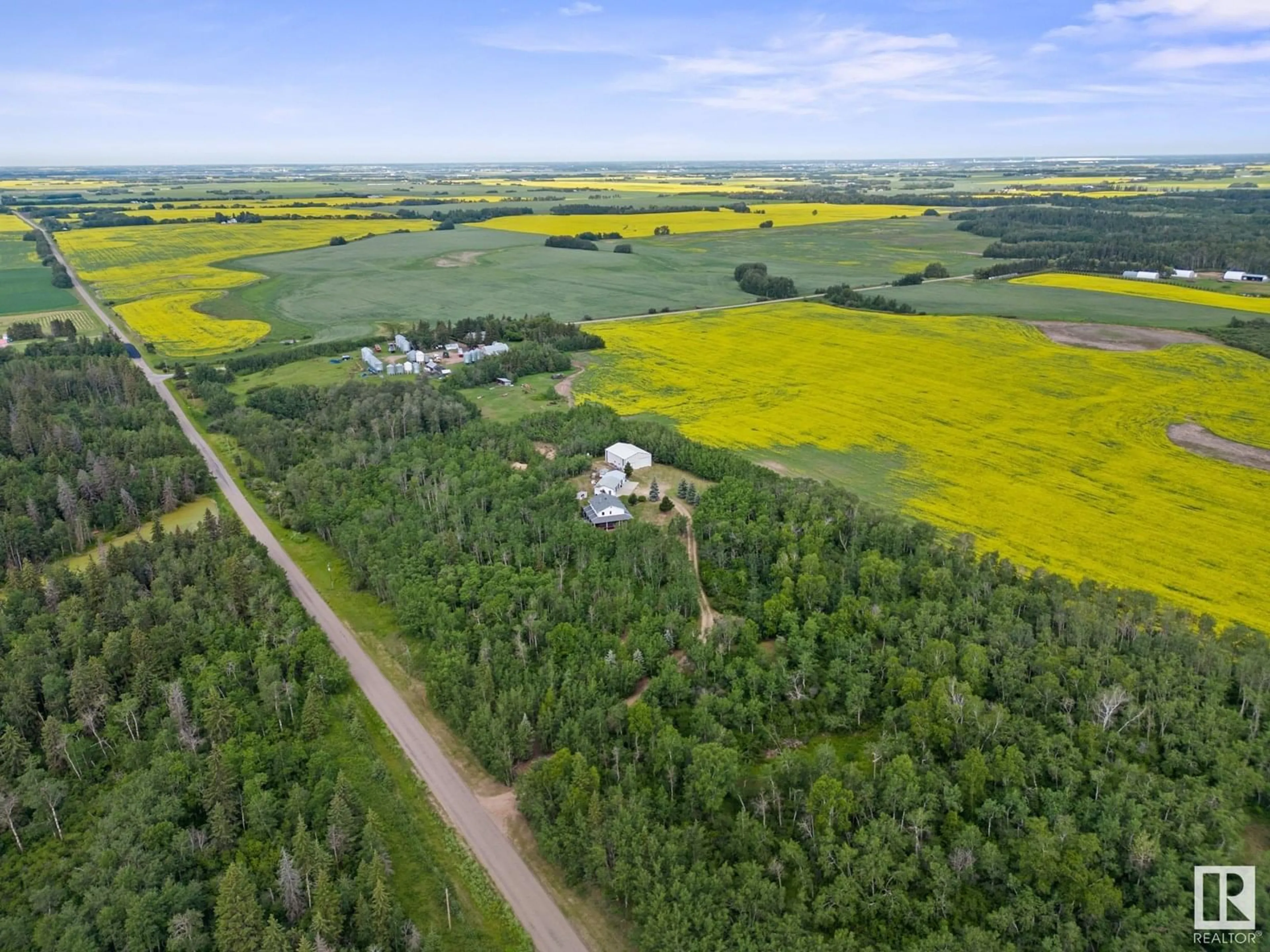 A pic from outside/outdoor area/front of a property/back of a property/a pic from drone, forest/trees view for 20456 TWP ROAD 544, Rural Strathcona County Alberta T8L3Z3