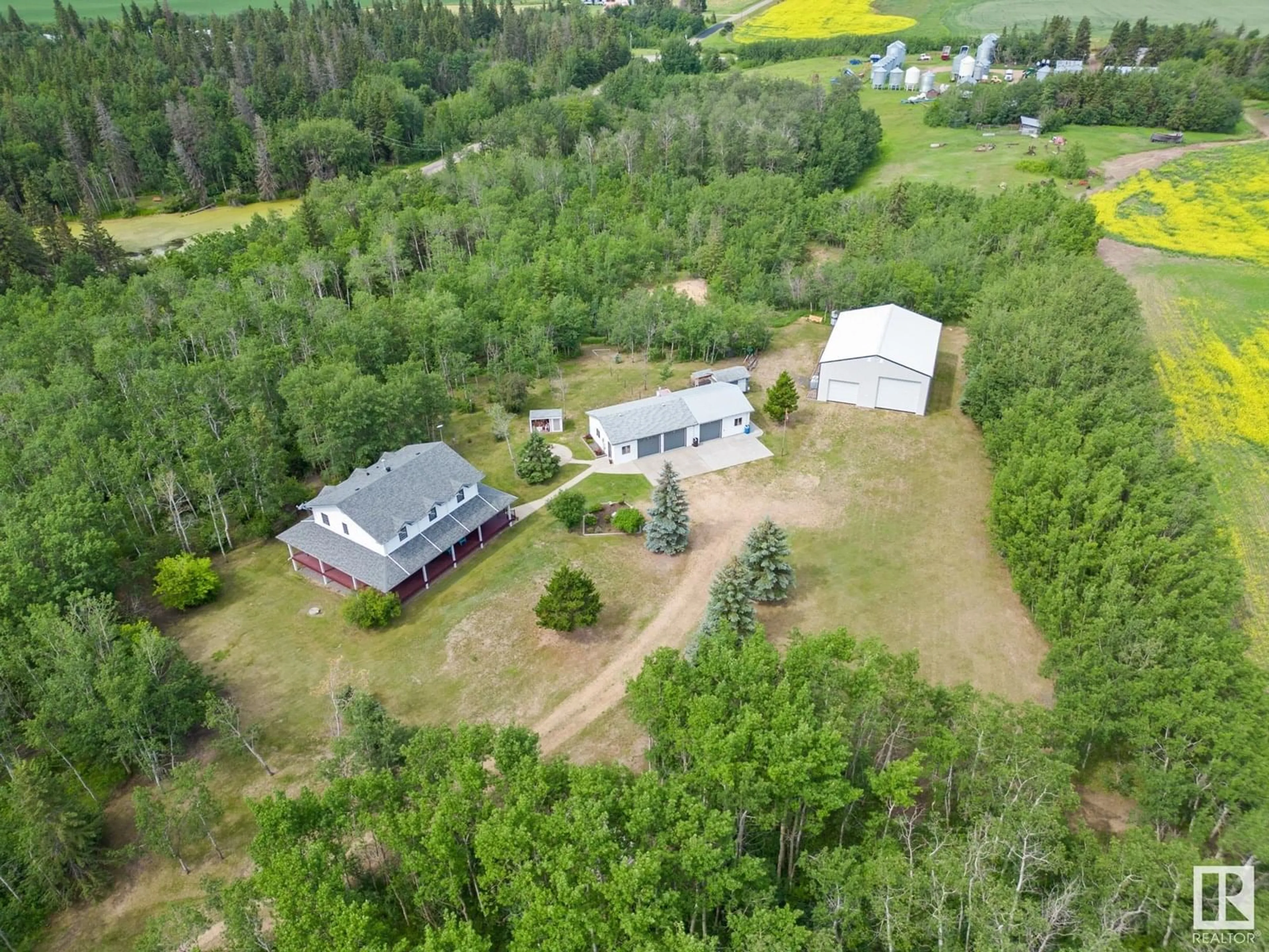 A pic from outside/outdoor area/front of a property/back of a property/a pic from drone, unknown for 20456 TWP ROAD 544, Rural Strathcona County Alberta T8L3Z3