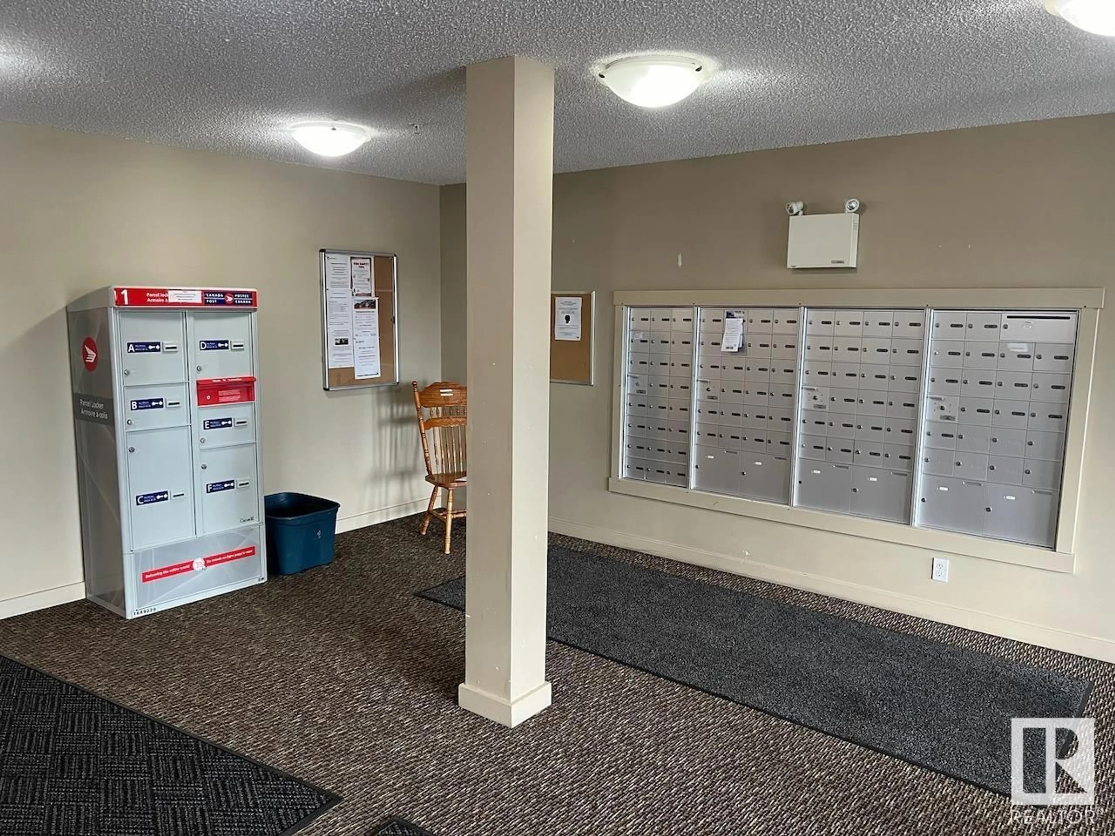 Indoor foyer for 403 - 5810 MULLEN PL, Edmonton Alberta T6R0W3