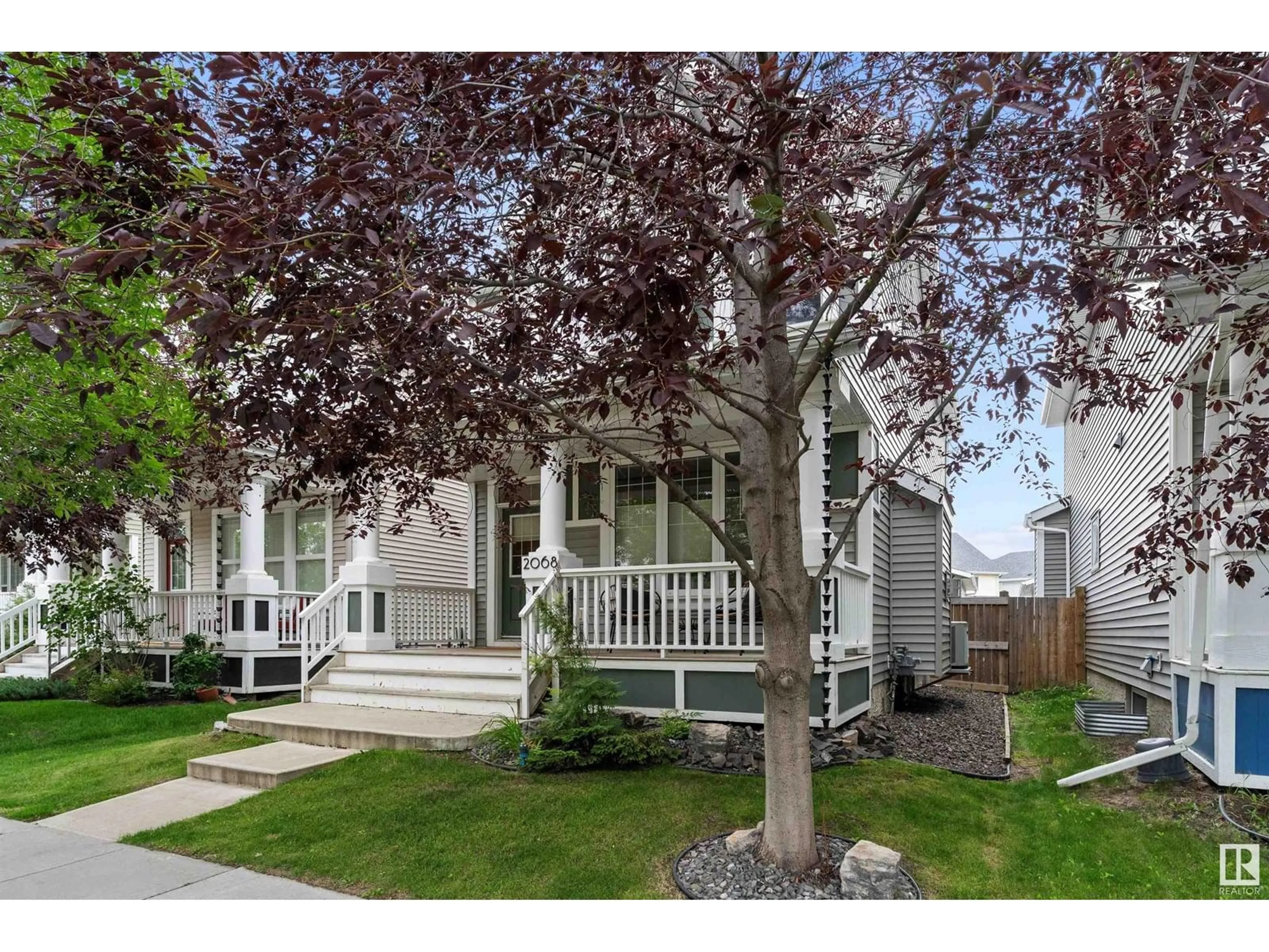 Home with vinyl exterior material, street for SW - 2068 74 ST, Edmonton Alberta T6X0L6