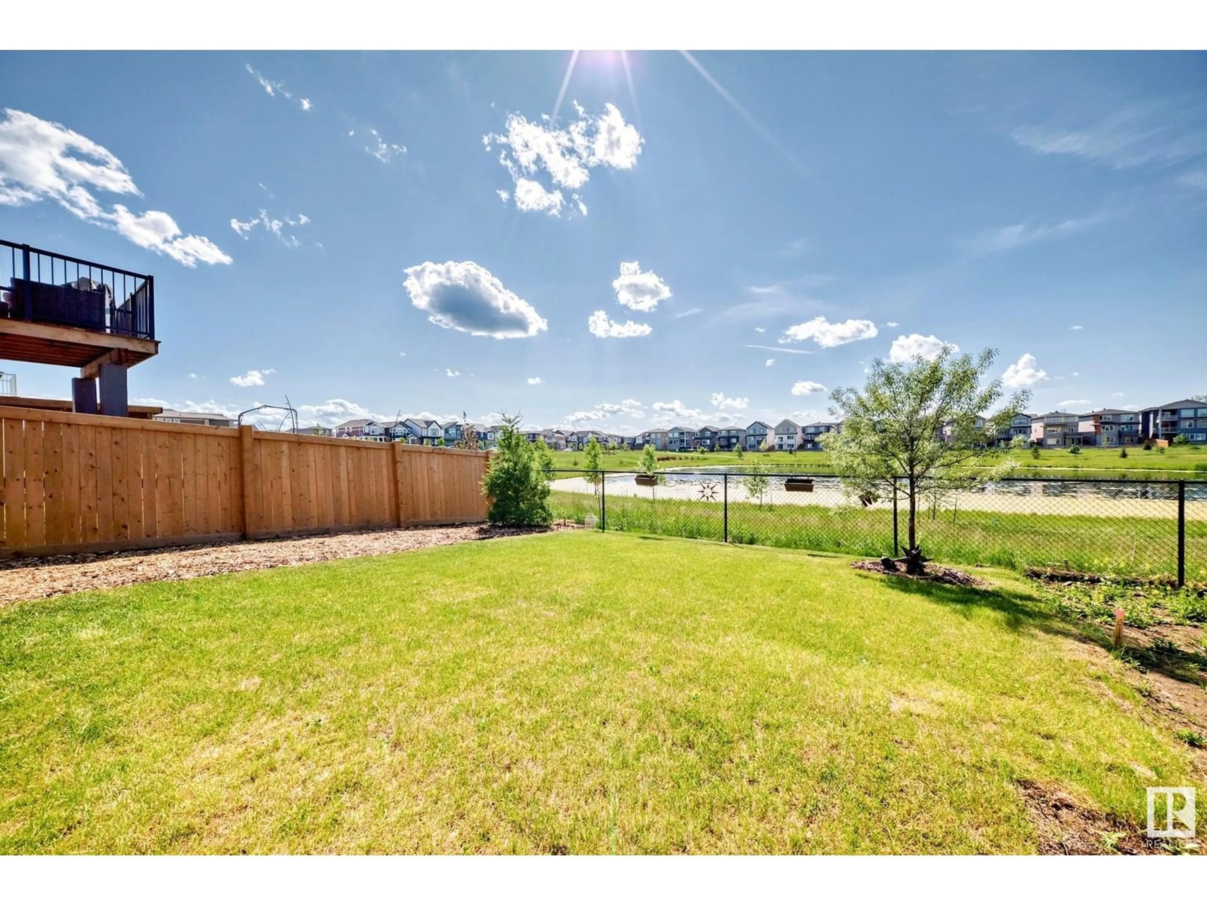 A pic from outside/outdoor area/front of a property/back of a property/a pic from drone, water/lake/river/ocean view for NW - 2532 206 ST, Edmonton Alberta T6M1P1
