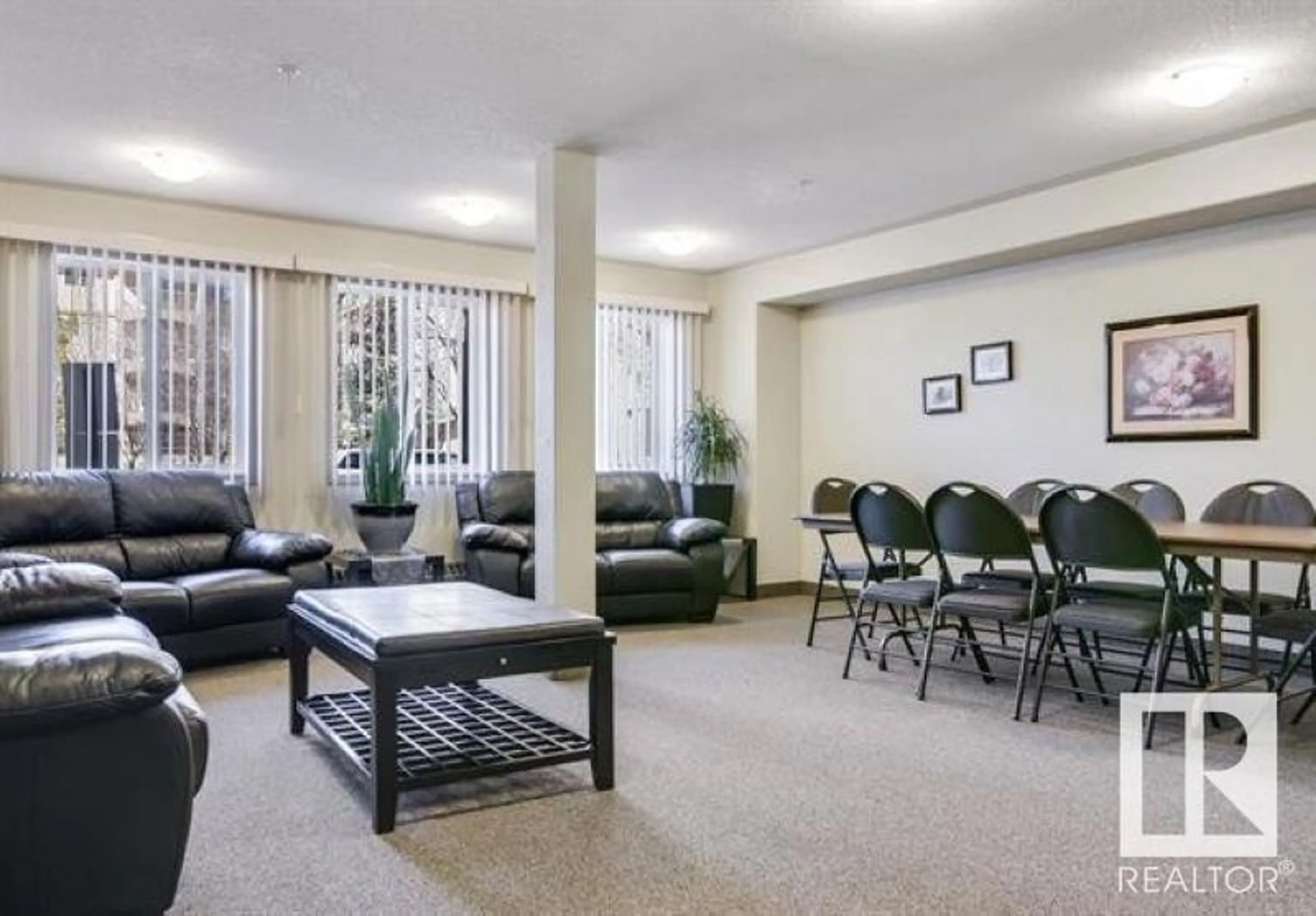 Living room with furniture, carpet floor for #216 - 12550 140 AV, Edmonton Alberta T5X6J4