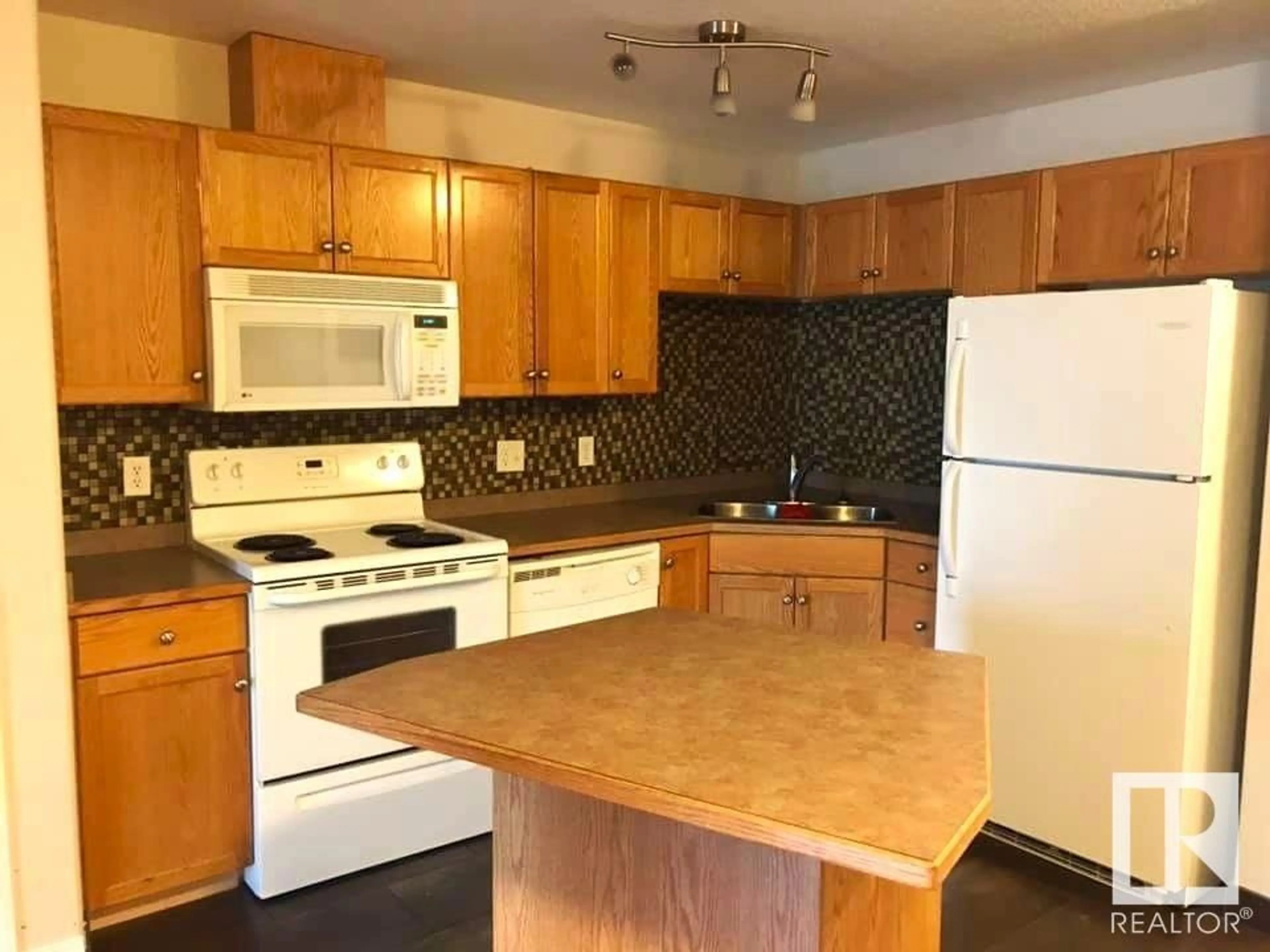 Standard kitchen, unknown for #216 - 12550 140 AV, Edmonton Alberta T5X6J4