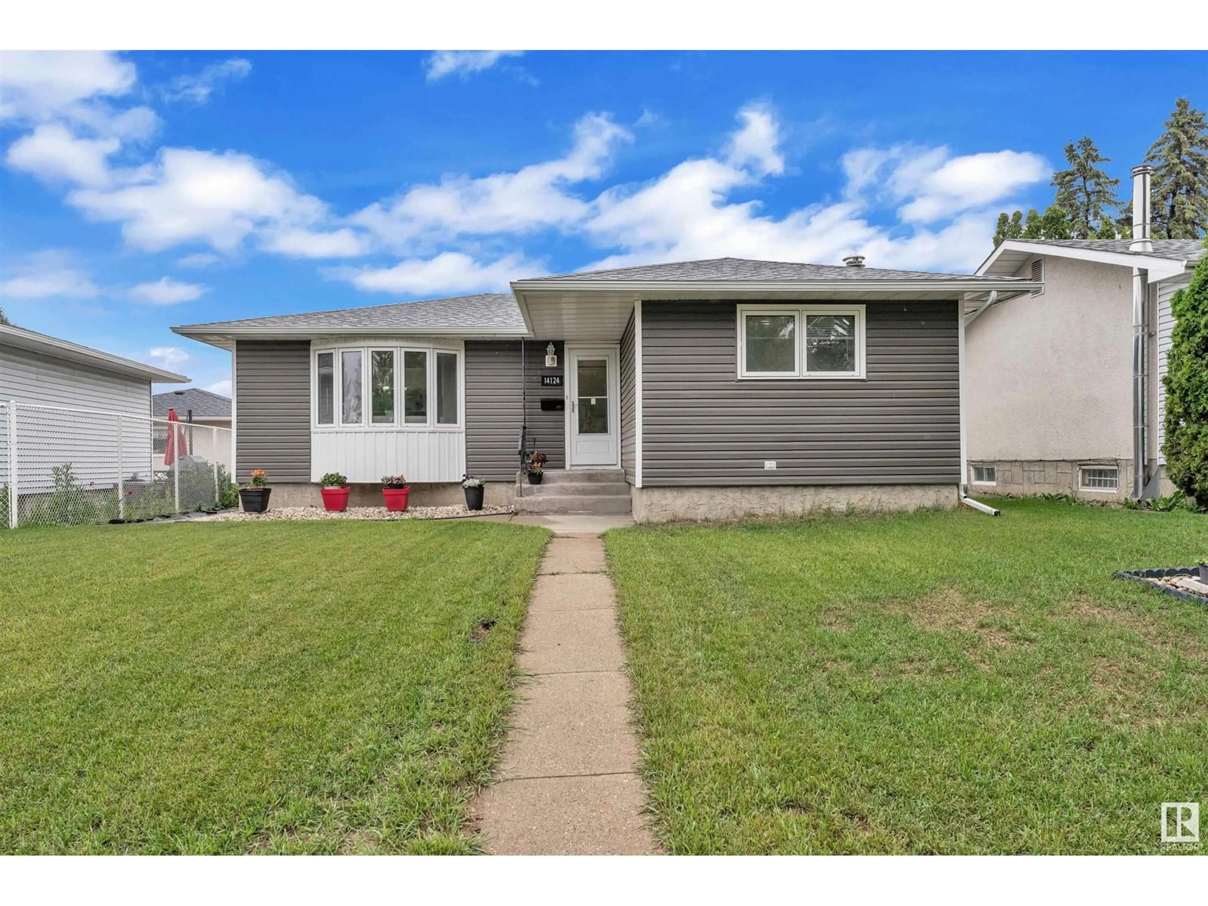 Home with vinyl exterior material, street for NW - 14124 72 ST, Edmonton Alberta T5C0R6