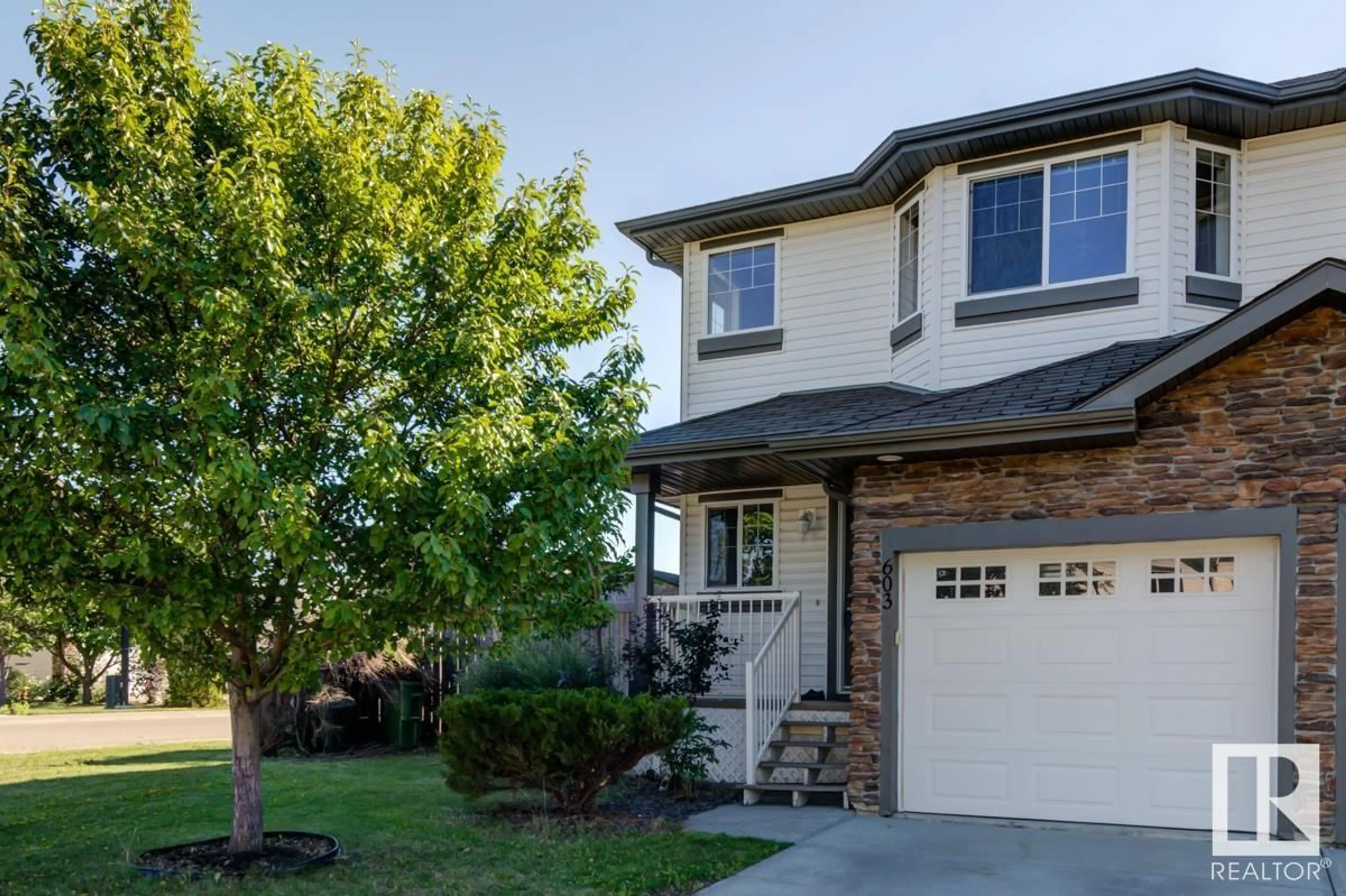 Home with vinyl exterior material, street for 603 62 ST, Edmonton Alberta T6X0G1