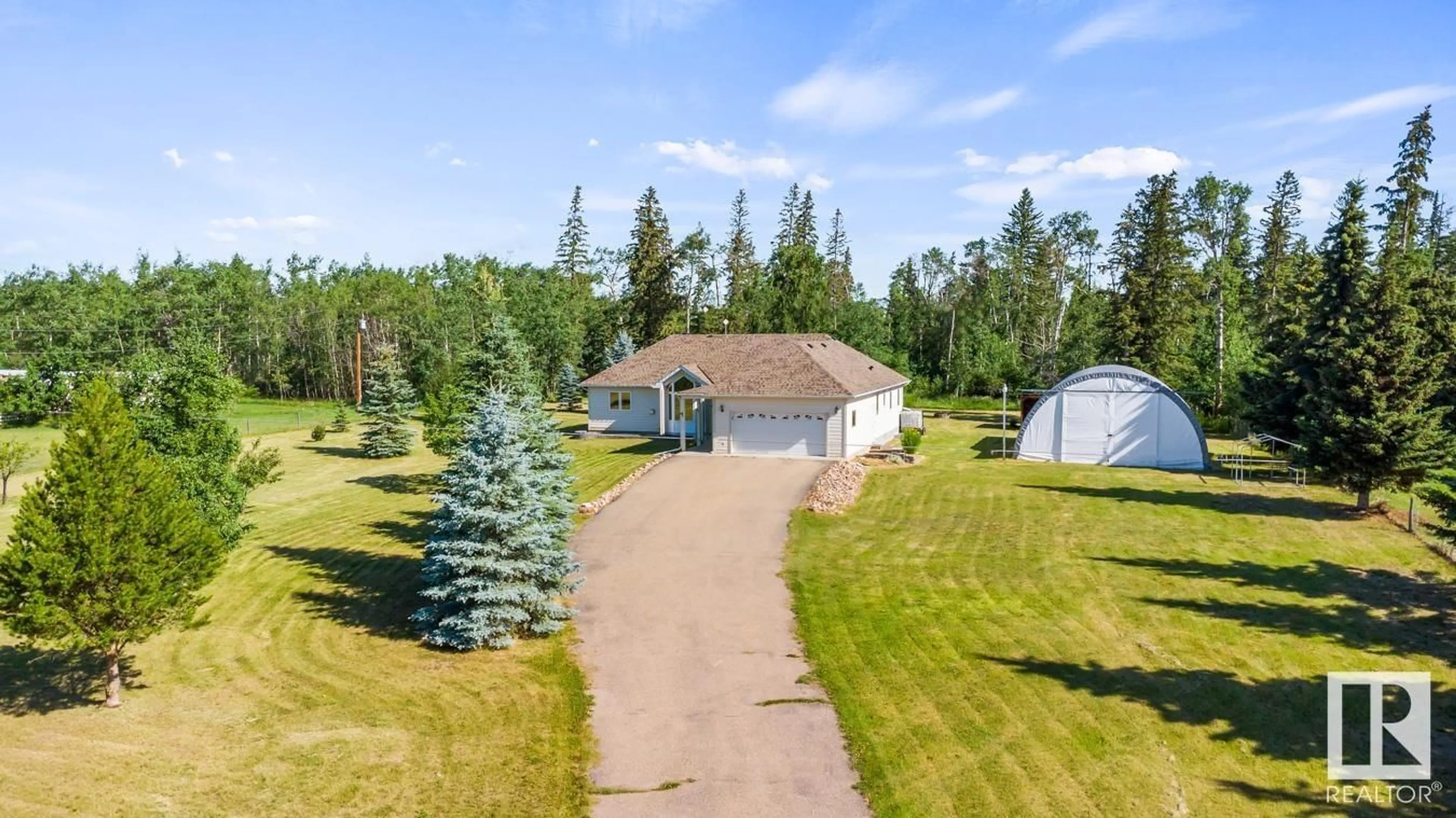 A pic from outside/outdoor area/front of a property/back of a property/a pic from drone, water/lake/river/ocean view for 14 - 255041 TWP ROAD 472, Rural Wetaskiwin County Alberta T0C1Z0