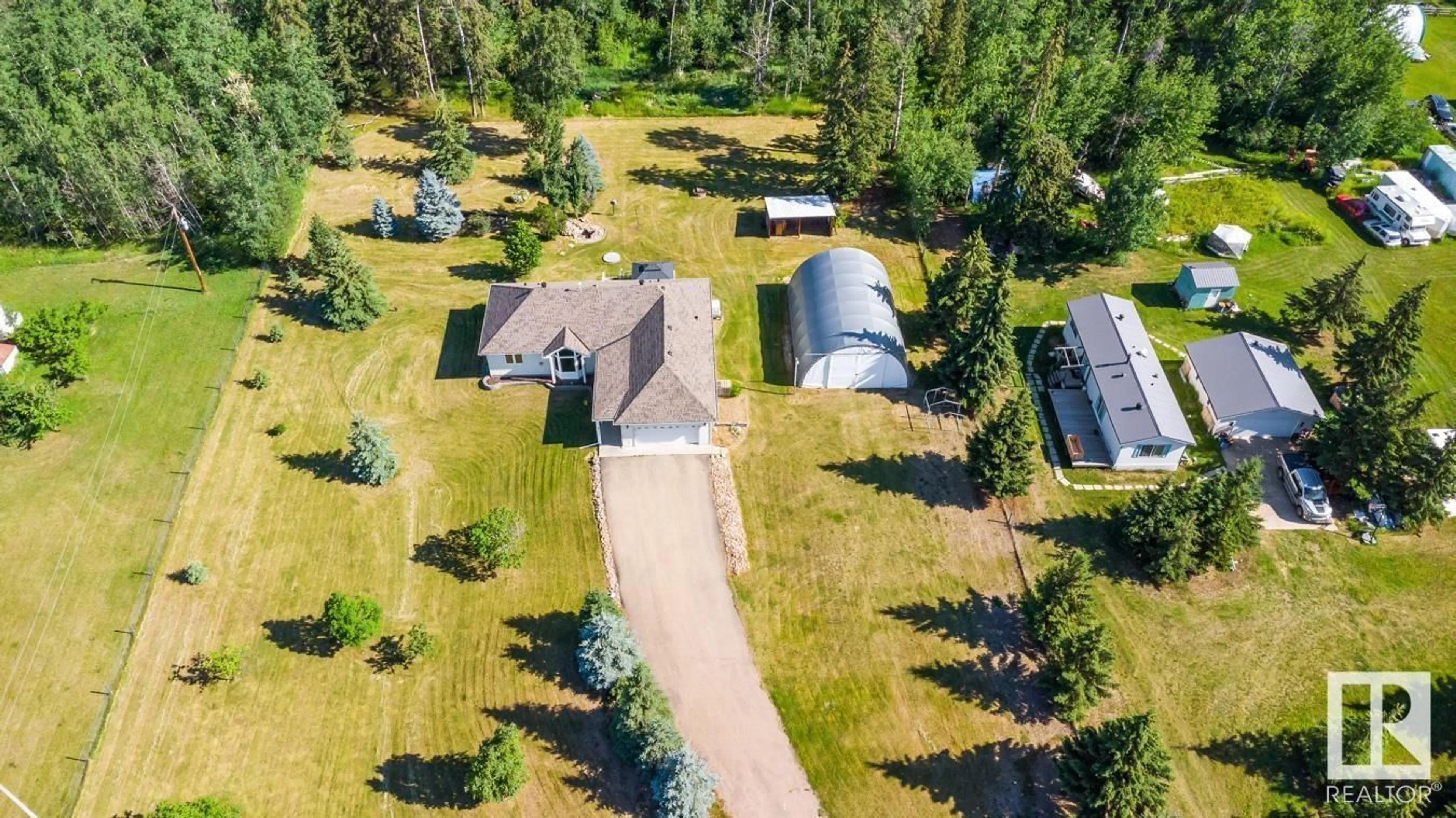 A pic from outside/outdoor area/front of a property/back of a property/a pic from drone, unknown for 14 - 255041 TWP ROAD 472, Rural Wetaskiwin County Alberta T0C1Z0