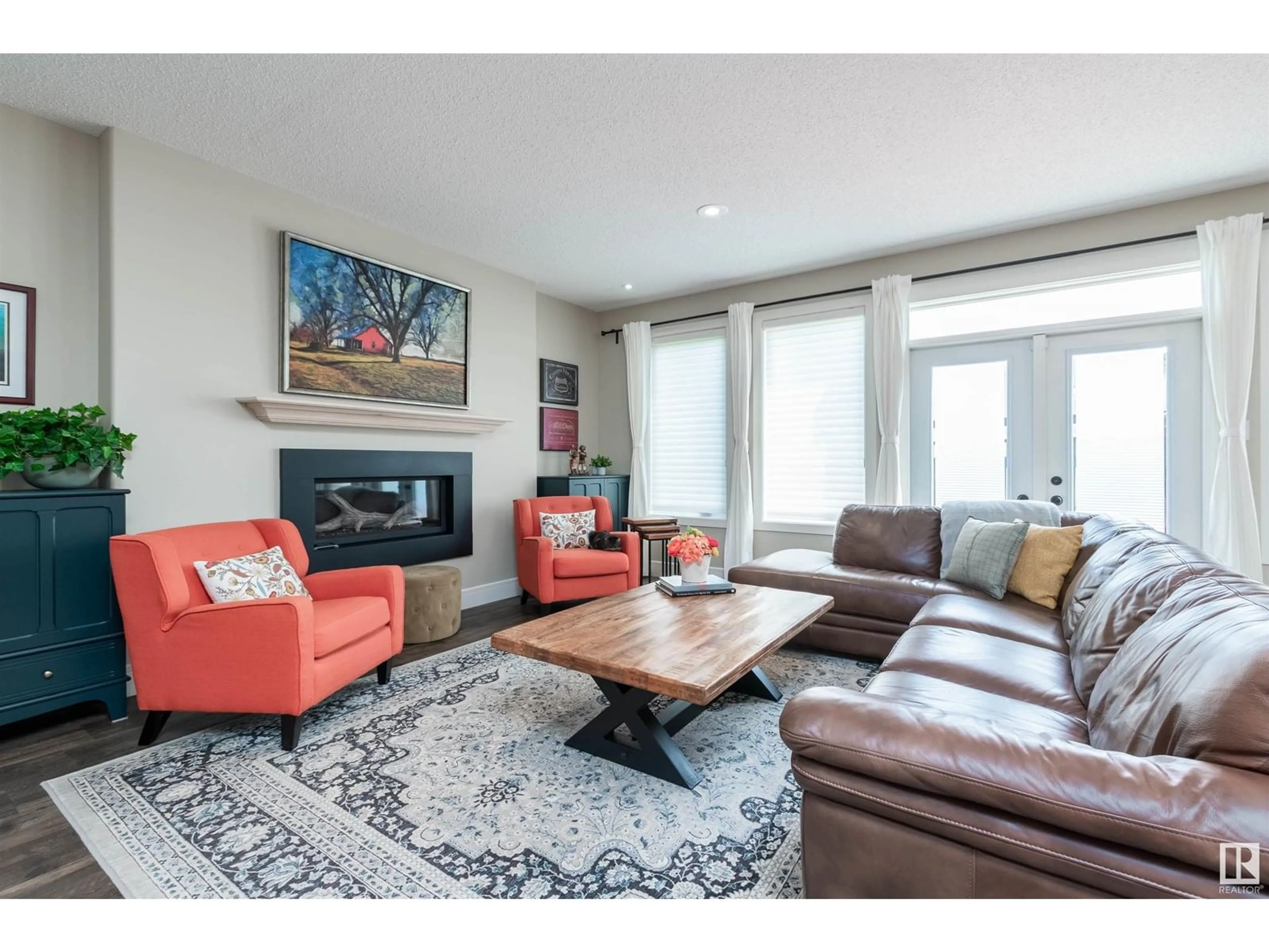 Living room with furniture, wood/laminate floor for 3687 WESTCLIFF WY, Edmonton Alberta T6W2T1