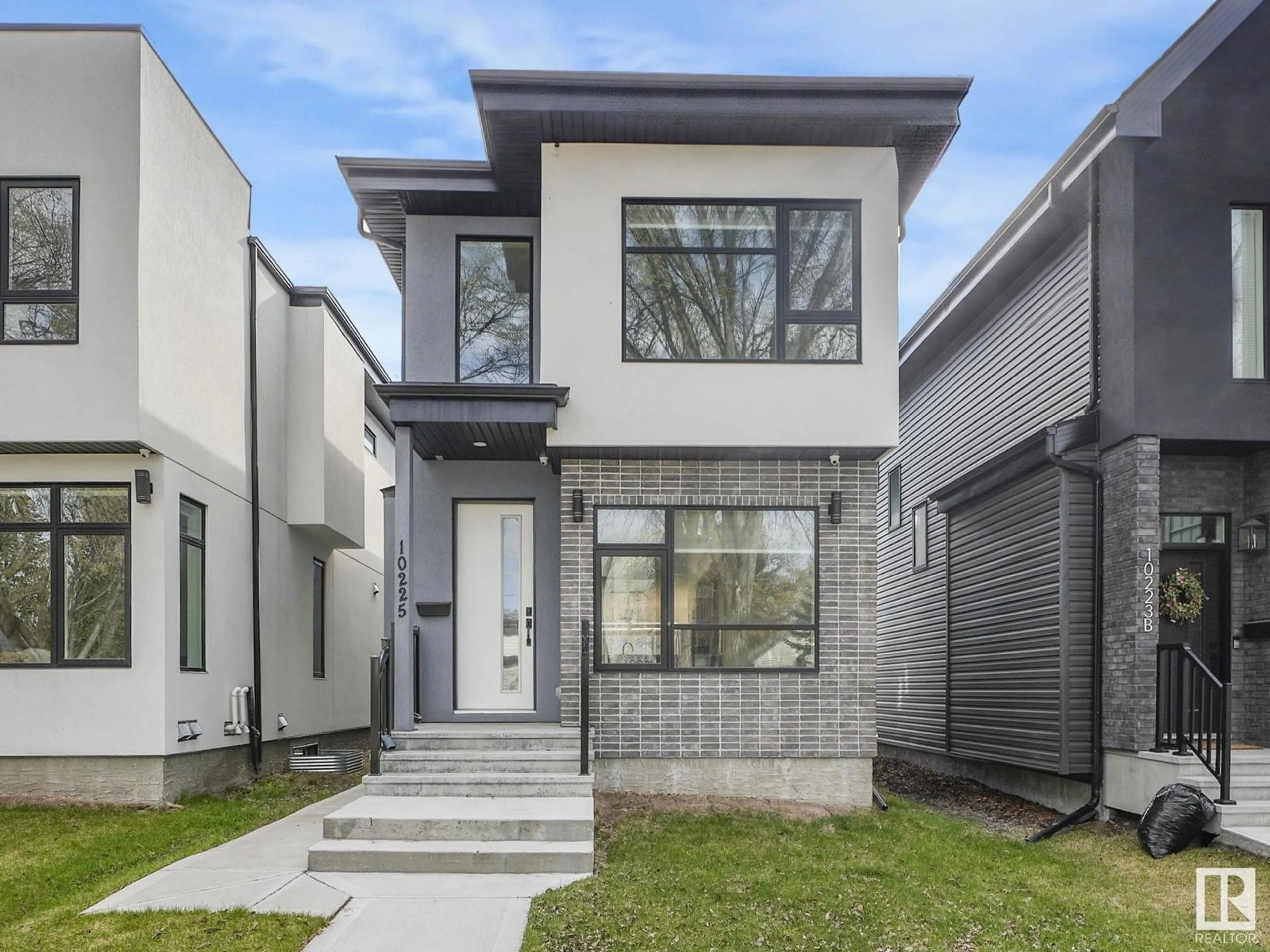 Home with brick exterior material, street for 10225 146 ST, Edmonton Alberta T5N3A1