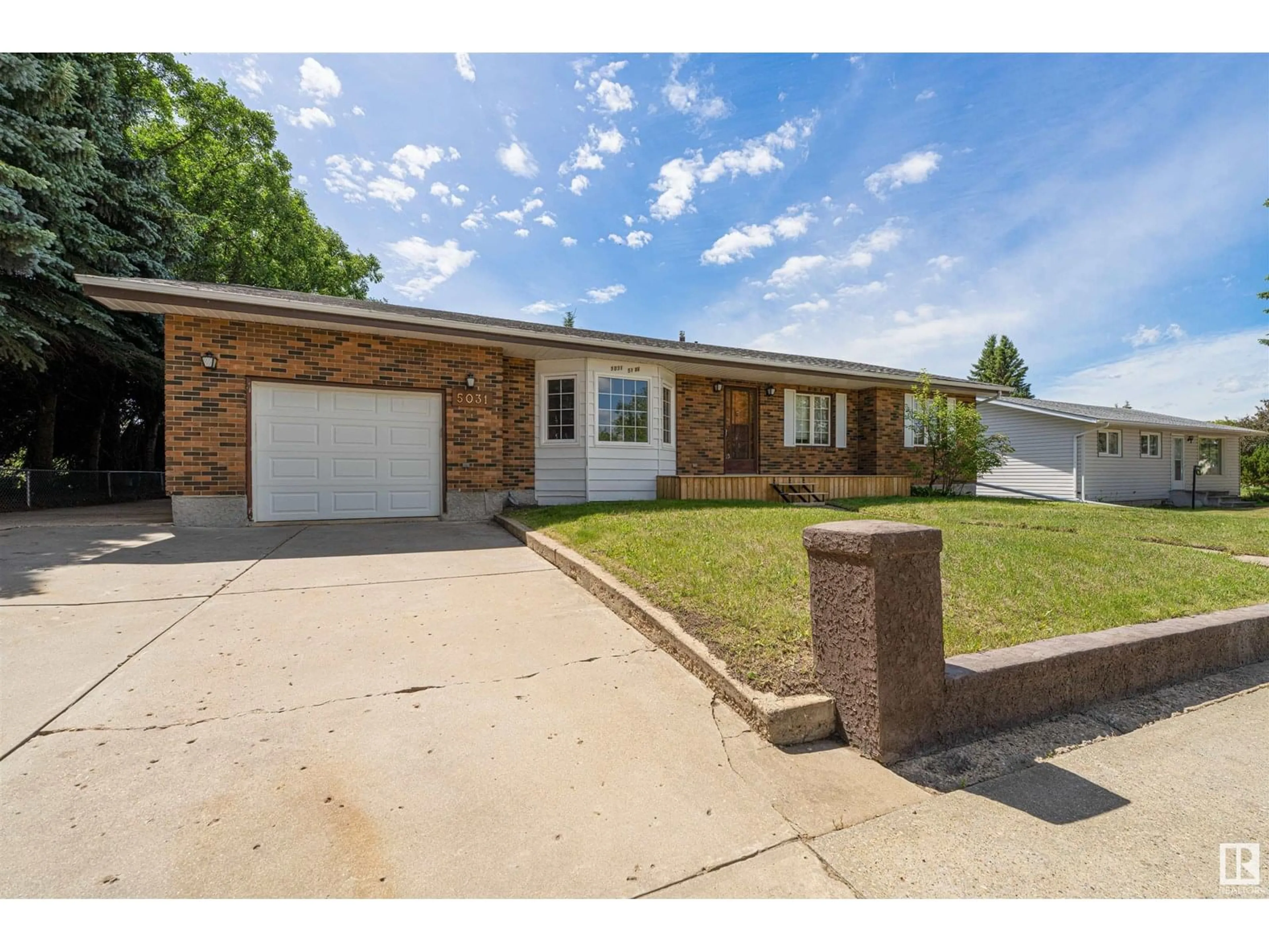 Home with brick exterior material, street for 5031 51 AV, Bruderheim Alberta T0B0S0