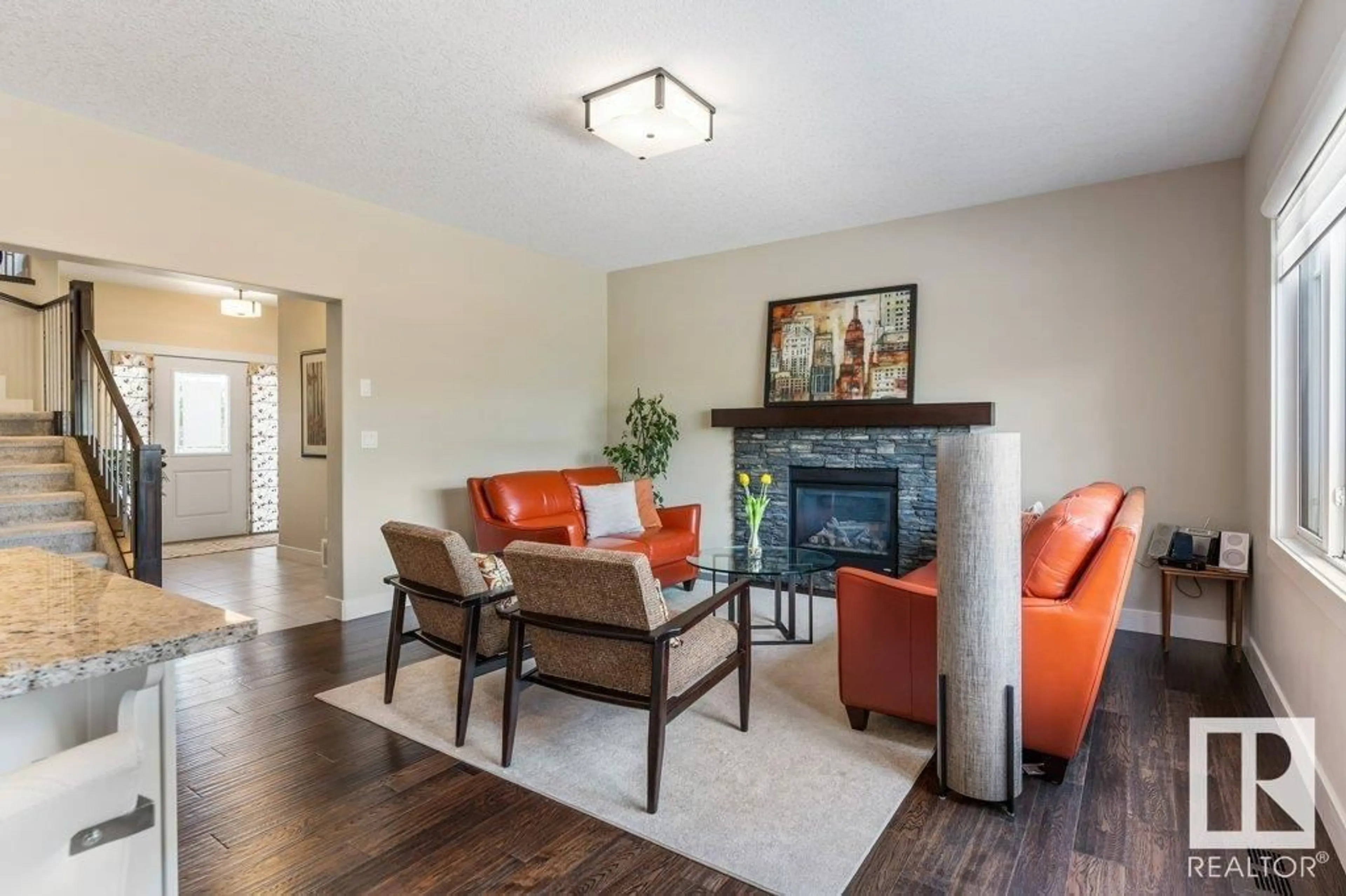 Living room with furniture, wood/laminate floor for 7 NAULT CR, St. Albert Alberta T8N4C1