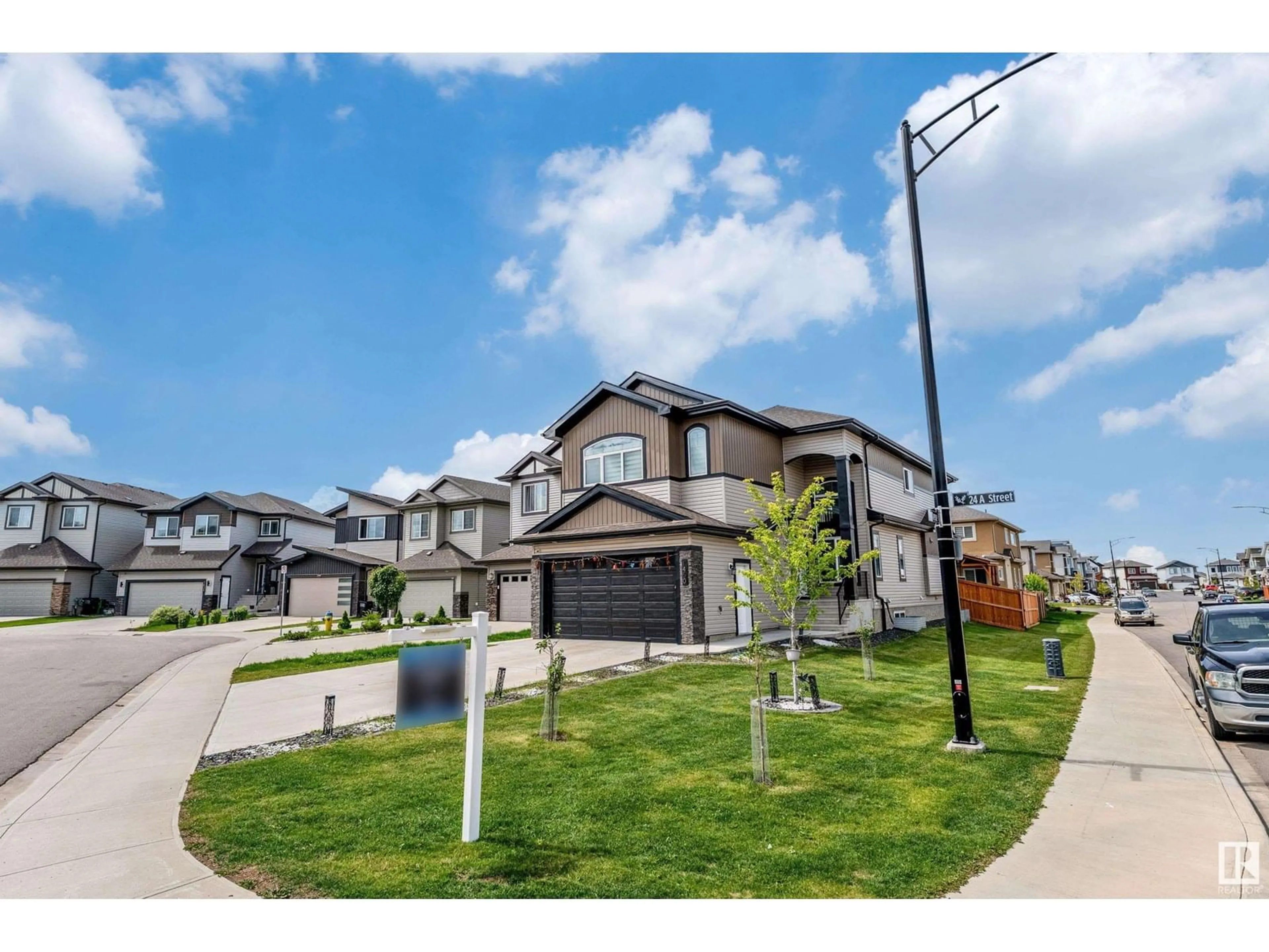A pic from outside/outdoor area/front of a property/back of a property/a pic from drone, street for 1450 24A ST, Edmonton Alberta T6T2J8