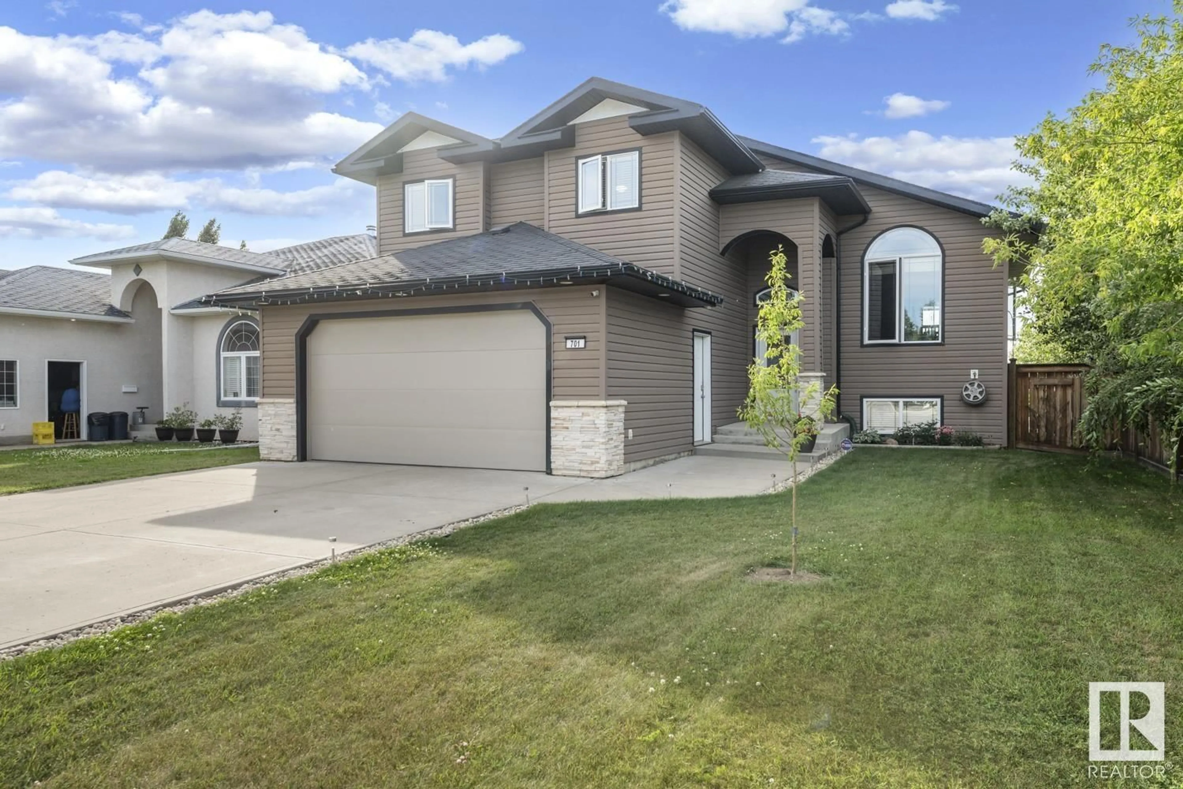 Home with vinyl exterior material, street for 701 21 STREET, Cold Lake Alberta T9M1M8