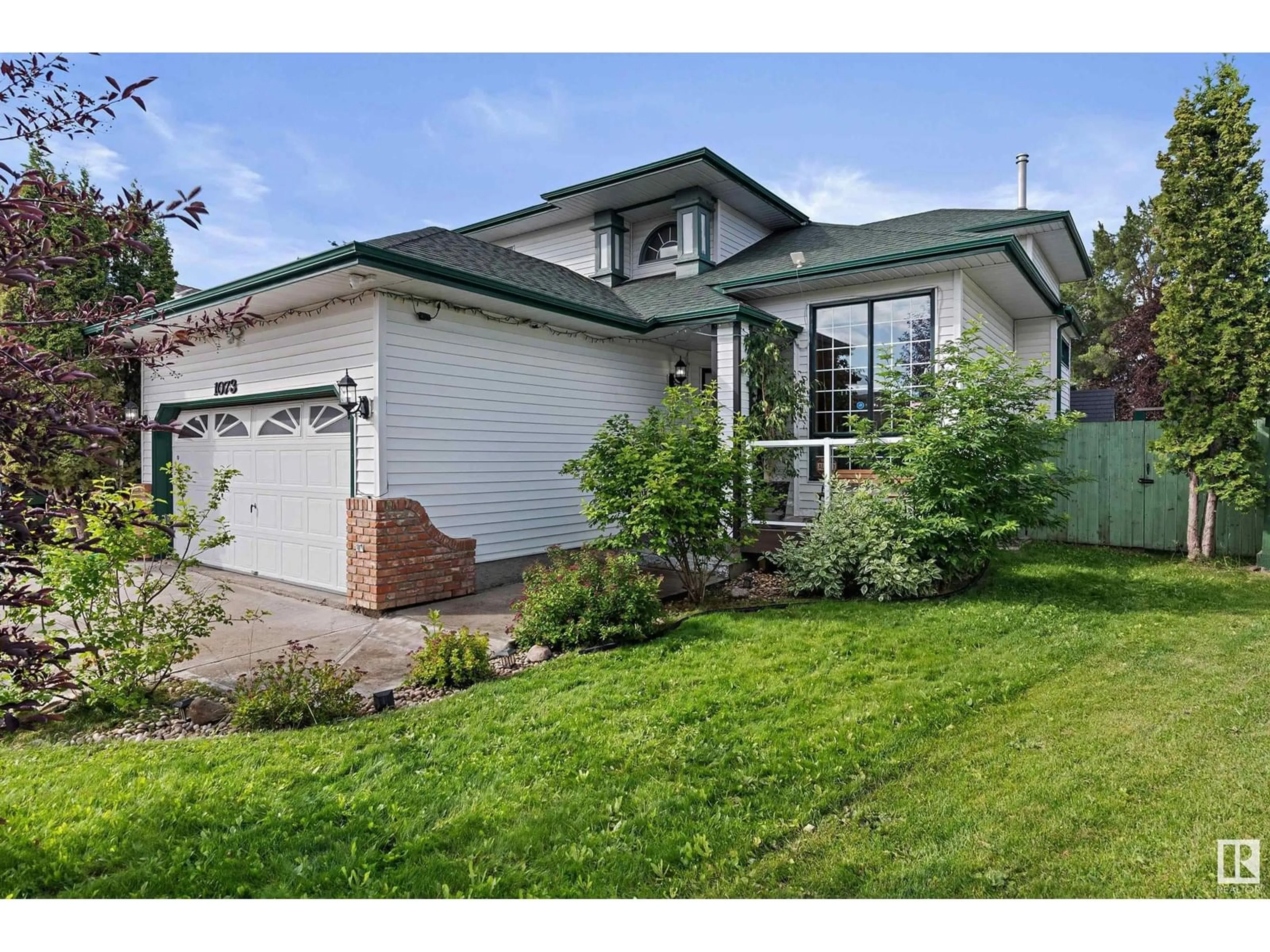Home with brick exterior material, street for 1073 POTTER GREENS DR, Edmonton Alberta T5T6A5