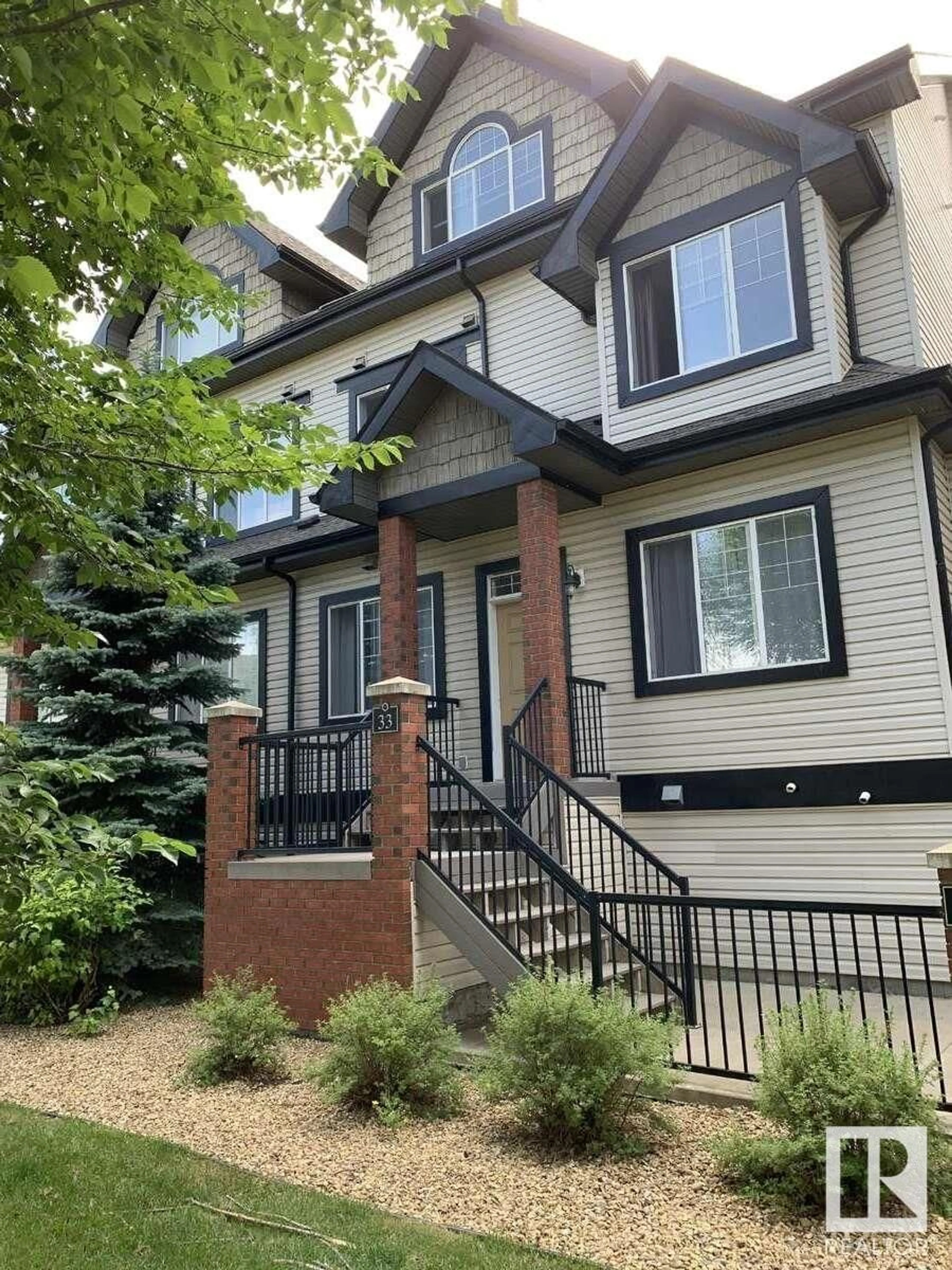 Home with brick exterior material, street for #33 - 4821 TERWILLEGAR CM, Edmonton Alberta T6R0C5